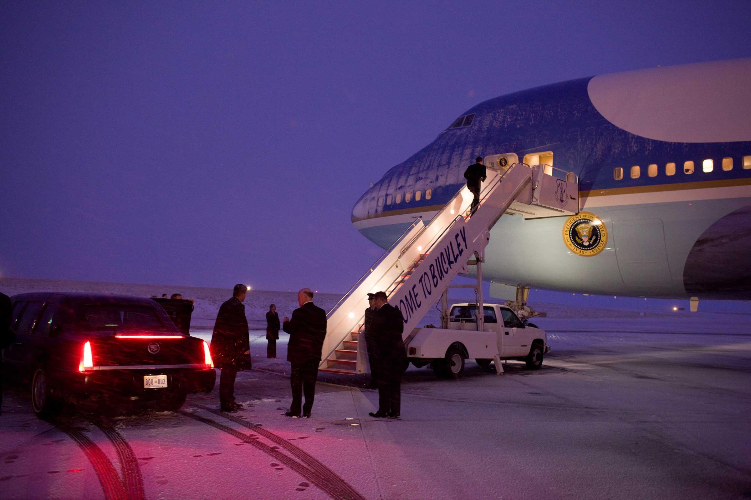 President Barack Obama boards Air Force One at Buckley Air Force Base in Denver, Colo., en route to Las Vegas, Nev., Feb. 18, 2010. (Official White House Photo by Pete Souza)This official White House photograph is being made available only for publication by news organizations and/or for personal use printing by the subject(s) of the photograph. The photograph may not be manipulated in any way and may not be used in commercial or political materials, advertisements, emails, products, promotions that in any way suggests approval or endorsement of the President, the First Family, or the White House.