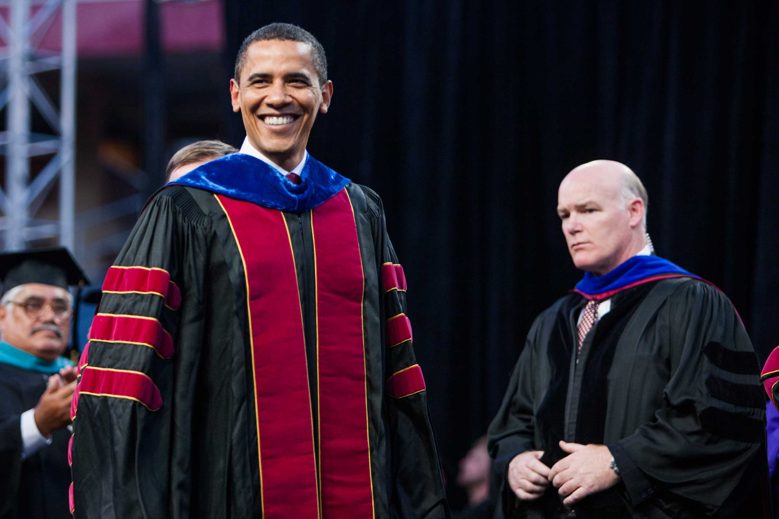 Clancy blends in on stage as Obama speaks at the Arizona State University commencement ceremony at Sun Devil Stadium in Tempe, Ariz. on May 13, 2009.