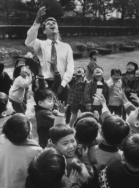 Robert F. Kennedy with Japanese children, 1962.