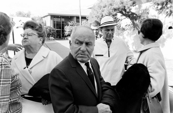 Outside the presidential suite at the Sands Hotel in Las Vegas in 1965, Frank Sinatra says goodbye to his mother, Dolly (left), and his father, Martin (center). They visited from New Jersey during the winter months.