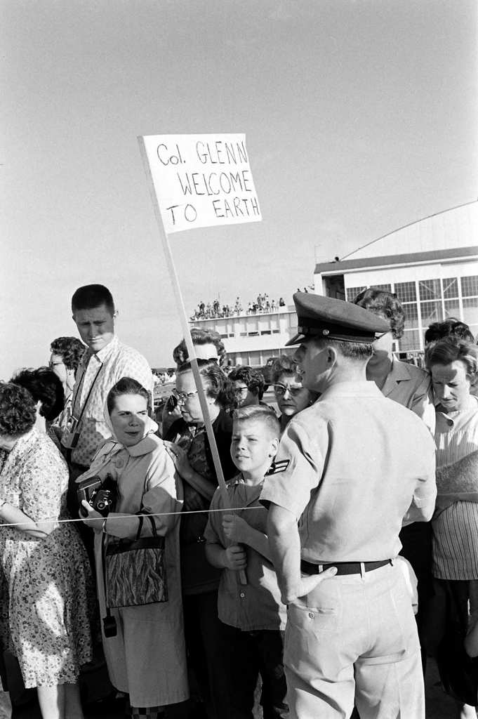 A sign honoring John Glenn outside Cape Canveral's famous "Hangar S," where Mercury astronauts suited up prior to flights, February 1962.