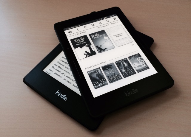 Amazon's new Kindle Voyage e-book reader sits atop last year's Kindle Paperwhite (Doug Aamoth / TIME)