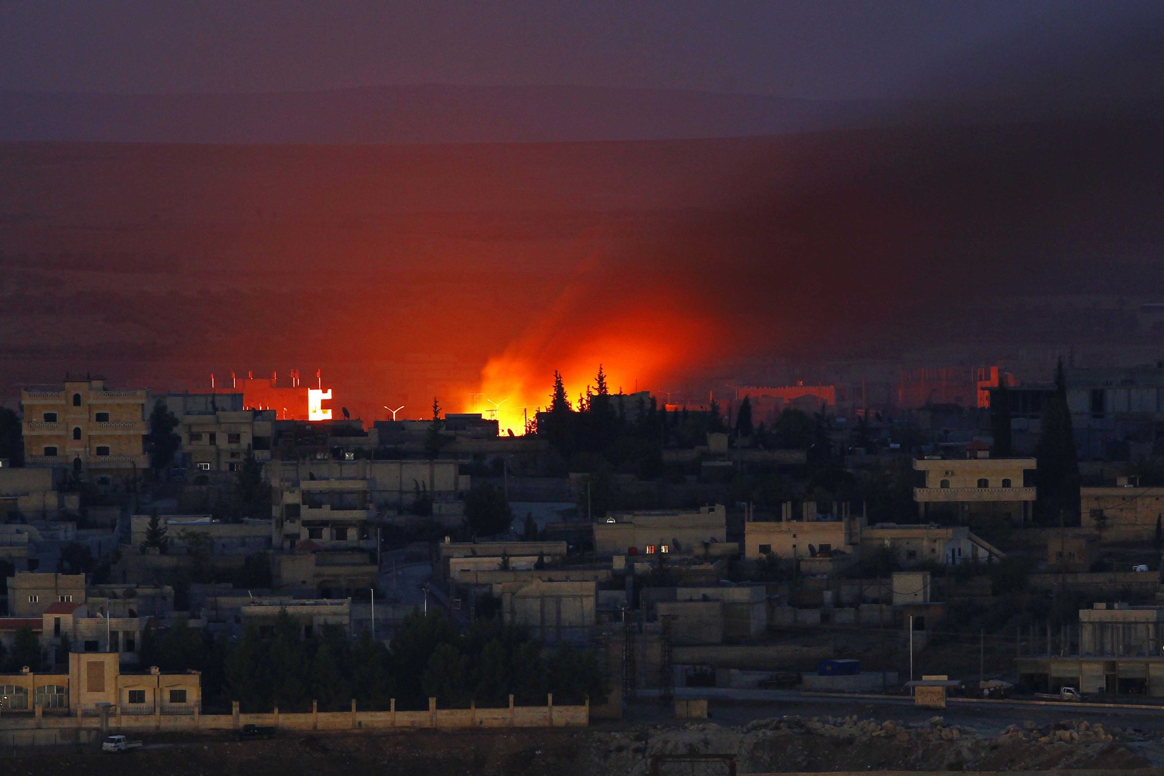 Fire is seen after an US airstrike on ISIS positions in Kobani, Syria, on Oct. 15, 2014.