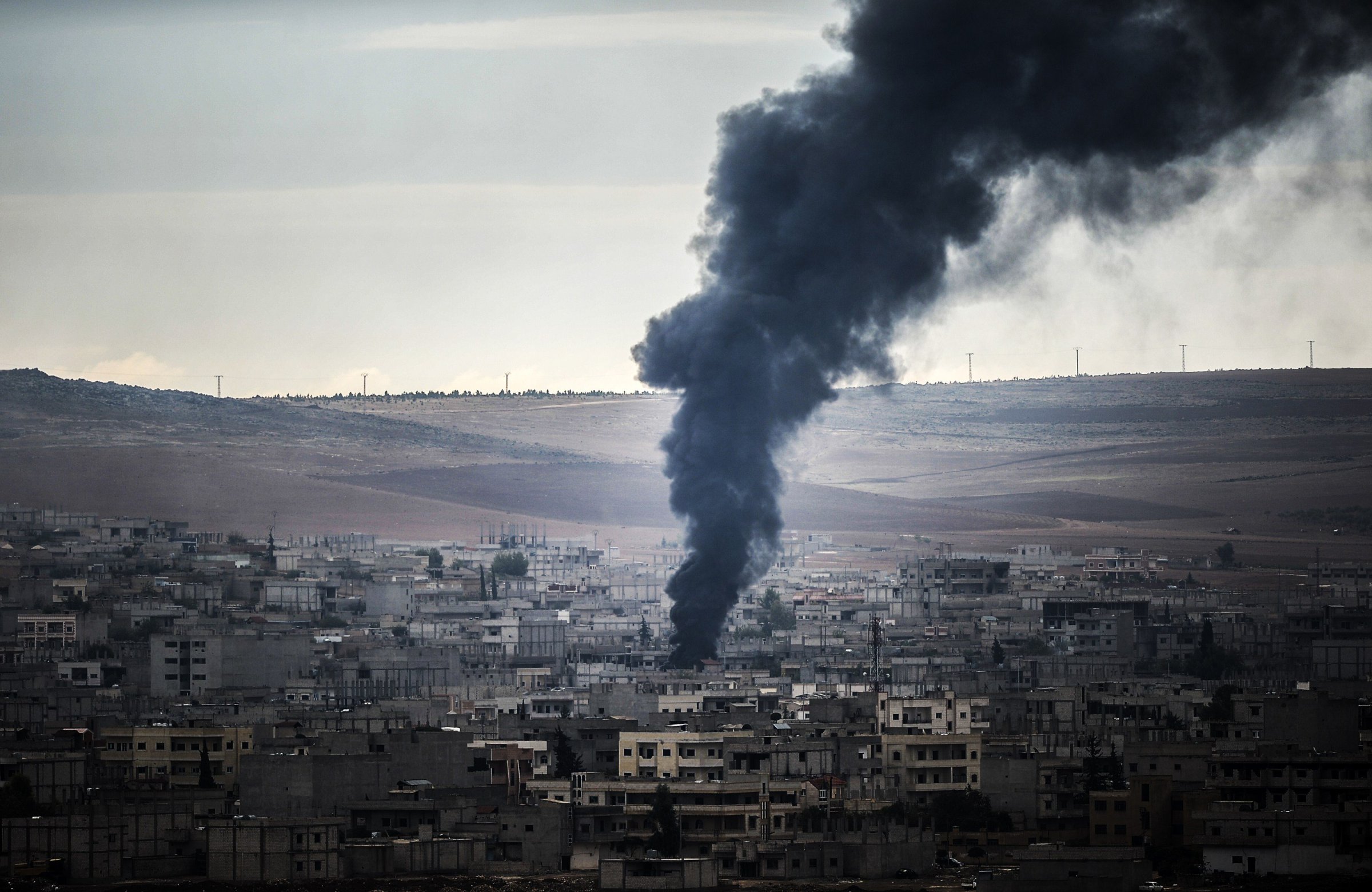 Smoke rises from the Syrian town of Kobani on Oct. 19, 2014.