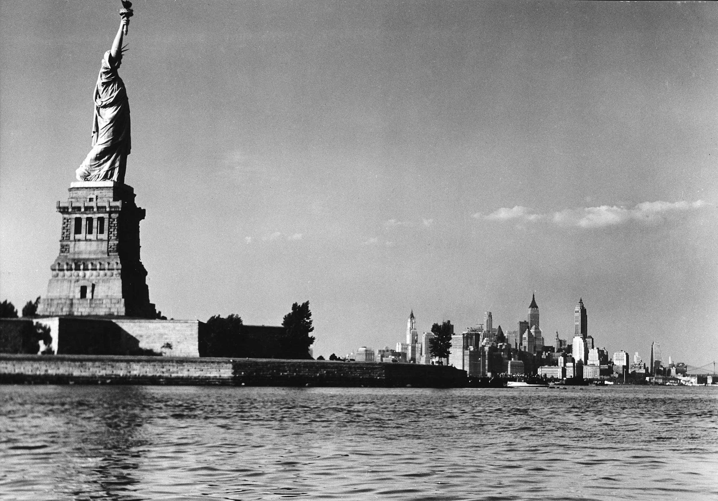 The Statue of Liberty and the New York skyline, 1939.