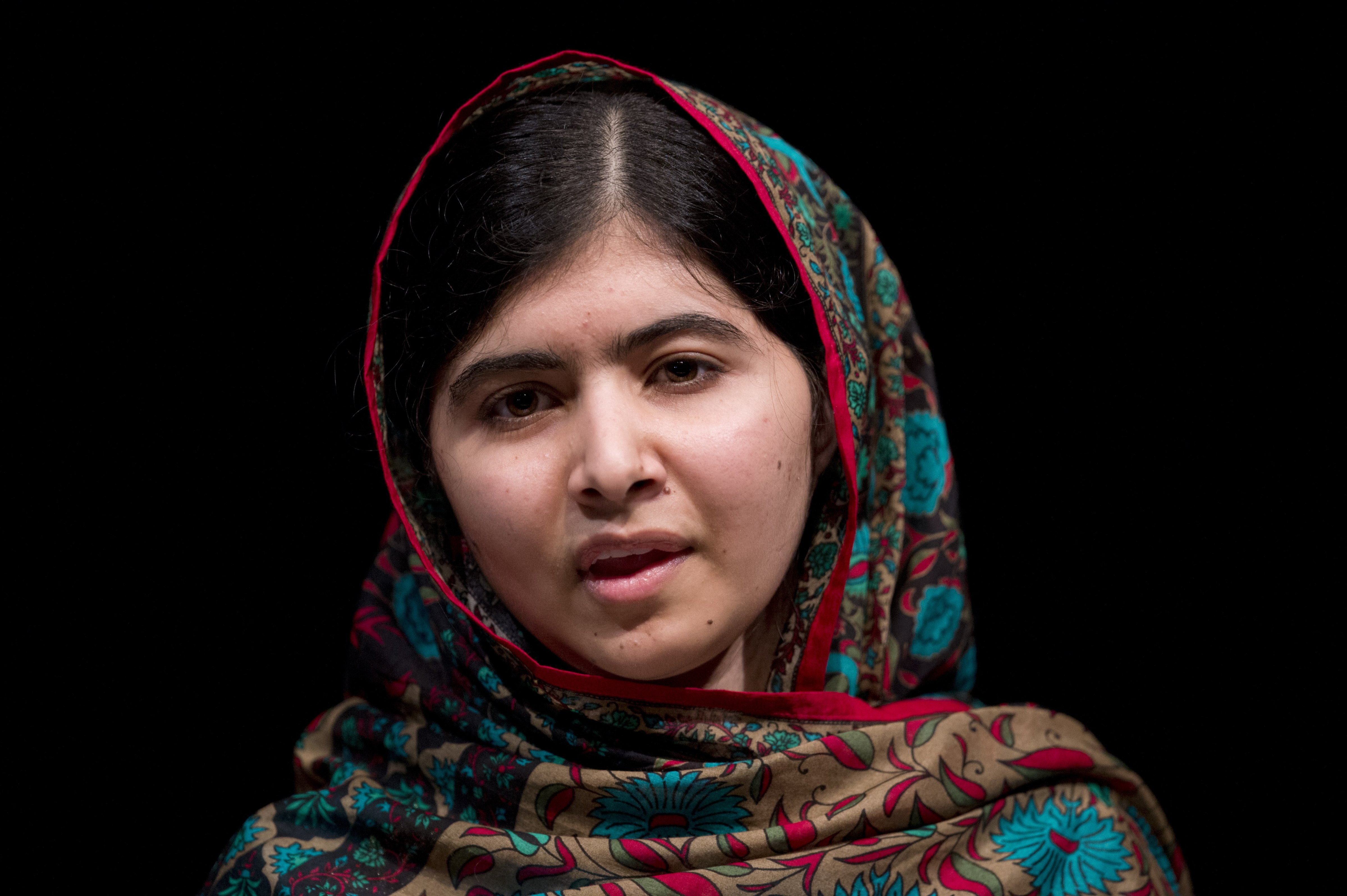 Pakistani rights activist Malala Yousafzai addresses the media in Birmingham, England on October 10, 2014.