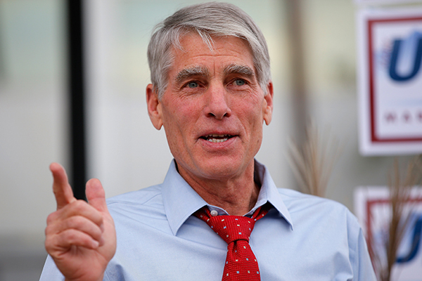 U.S. Sen. Mark Udall (D-CO) speaks to supporters as he kicks off his 'Mark Your Ballot' bus tour on Oct. 15, 2014 in Denver.
