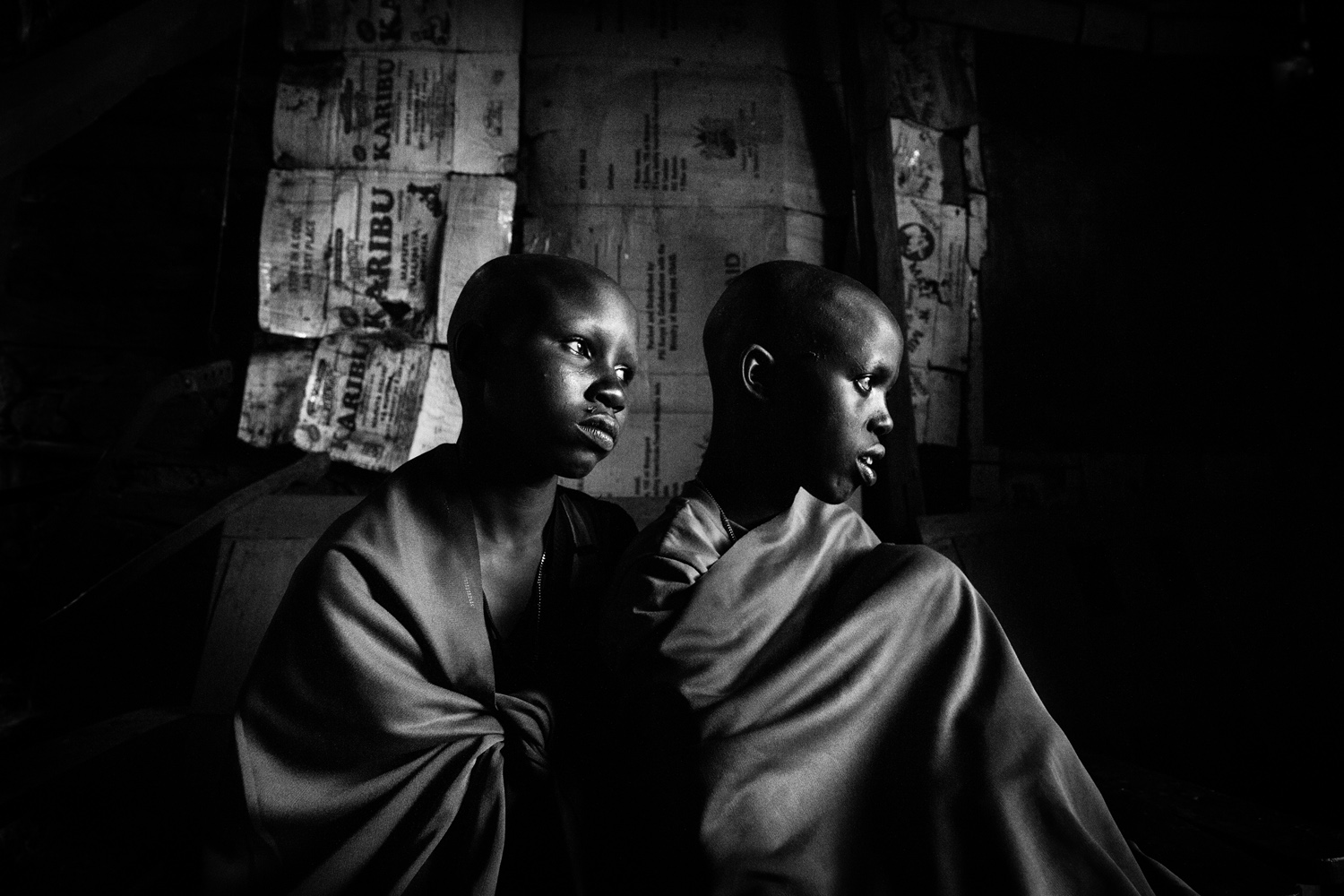 Two Maasai girls, a day before their planned circumcision. Kenya.