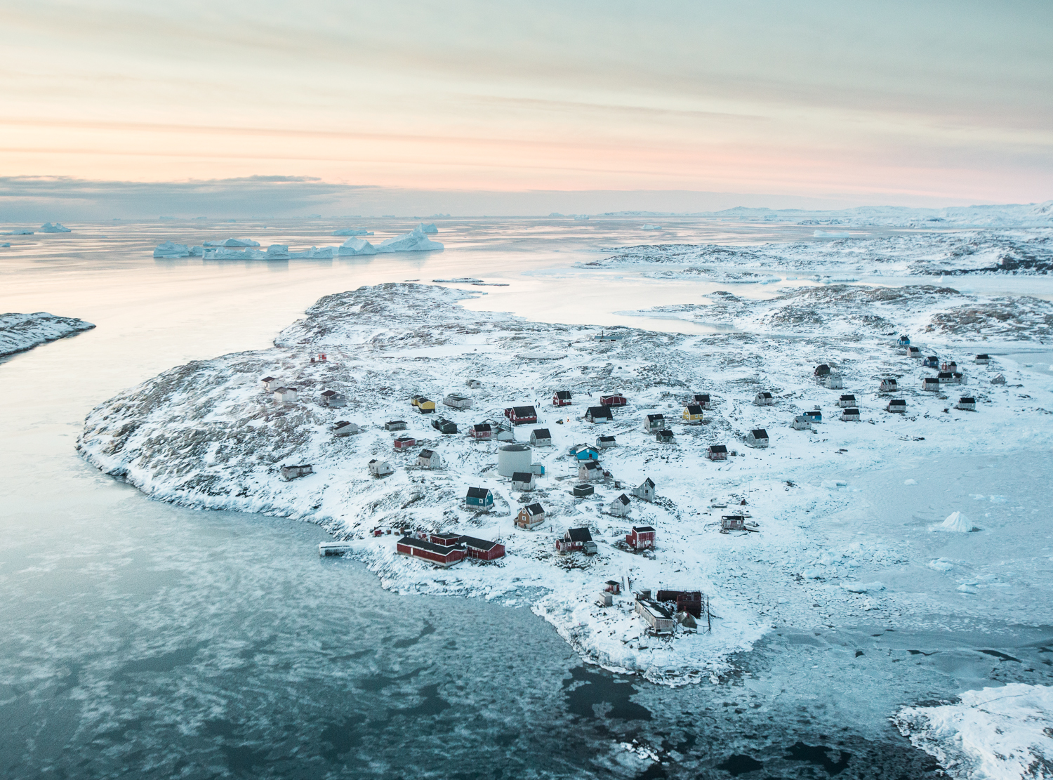 A view from the helicopter while flying over the pack ice from Tasiilaq to Isortoq—population 64—in eastern Greenland.