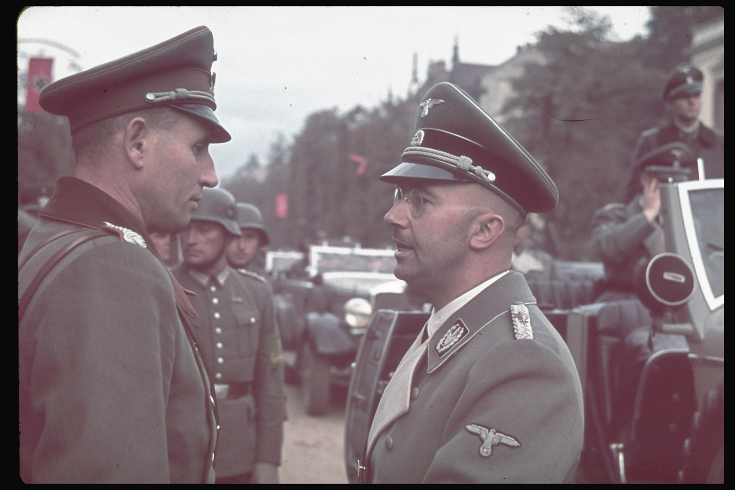 Head of the SS Heinrich Himmler (right), one of the chief architects of the Holocaust, speaks with an unidentified officer in Warsaw after German invasion of Poland, 1939.