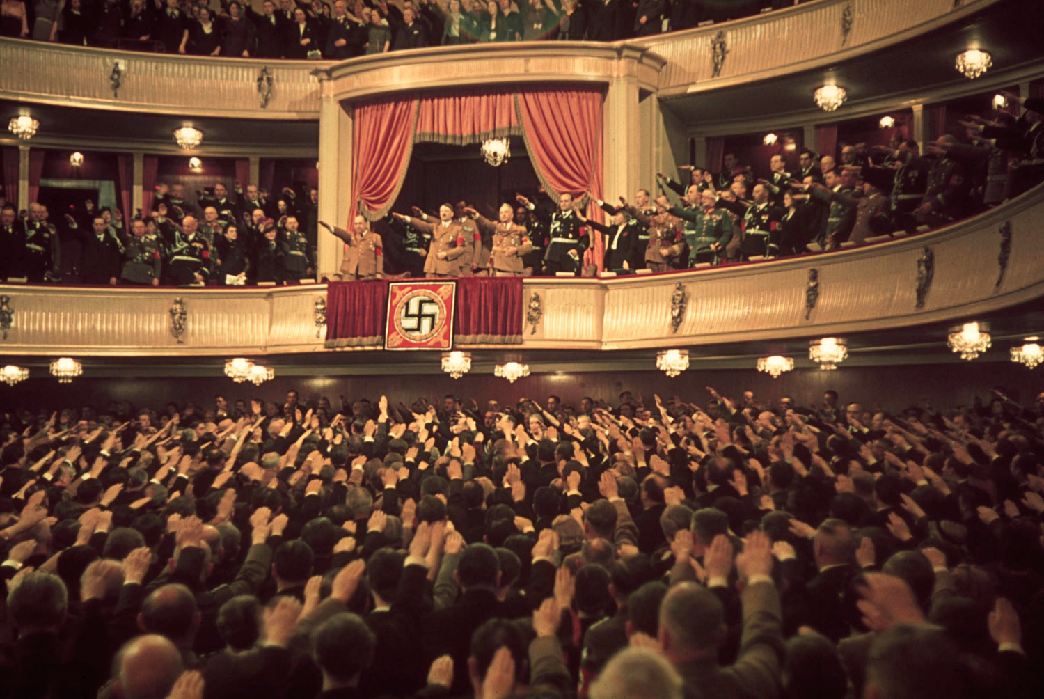 Adolf Hitler and Joseph Goebbels (in box) at Charlottenburg Theatre, Berlin, 1939.