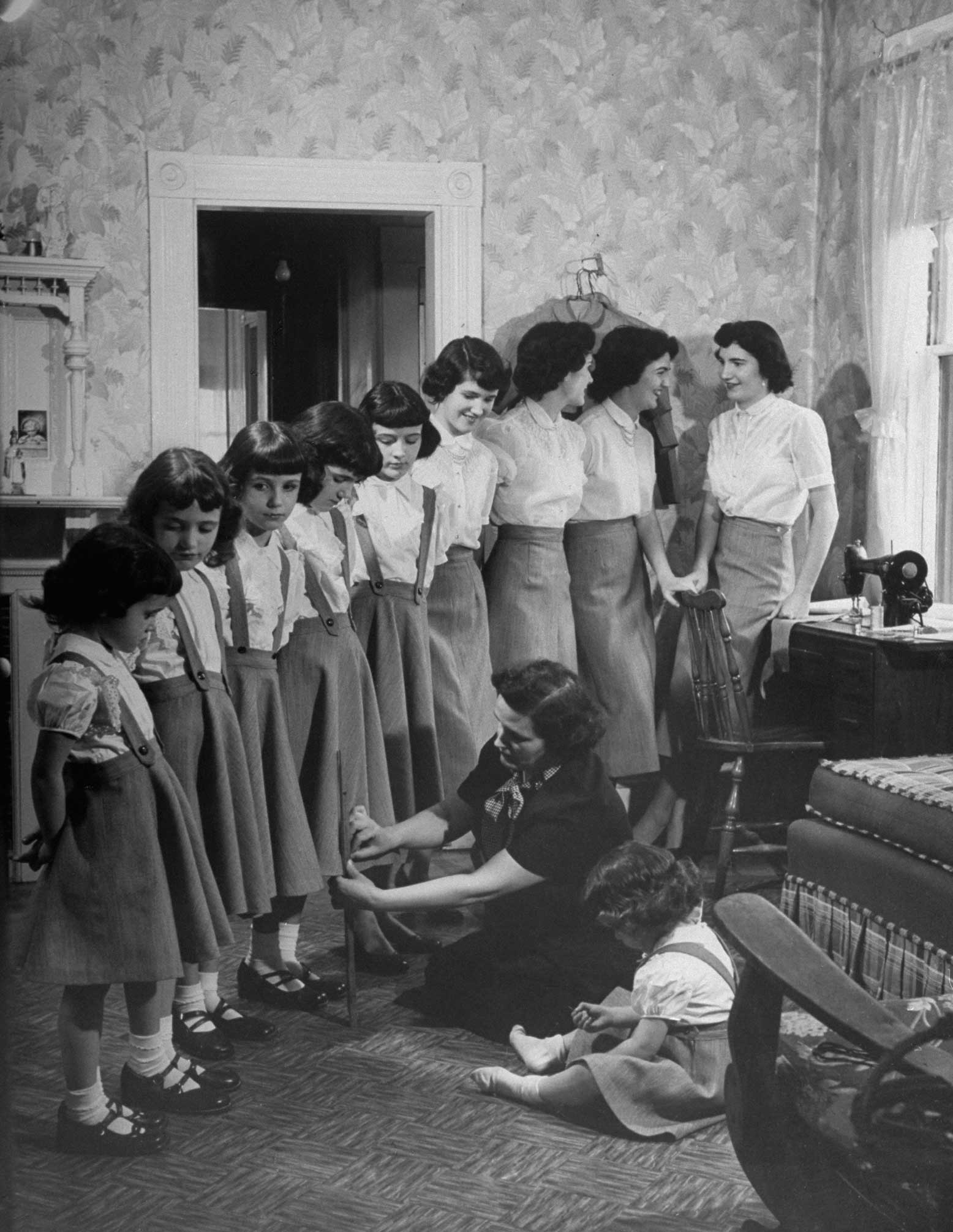 The famous "O'Neil sisters" (all 10 of them) with their mother, Boston, 1952.