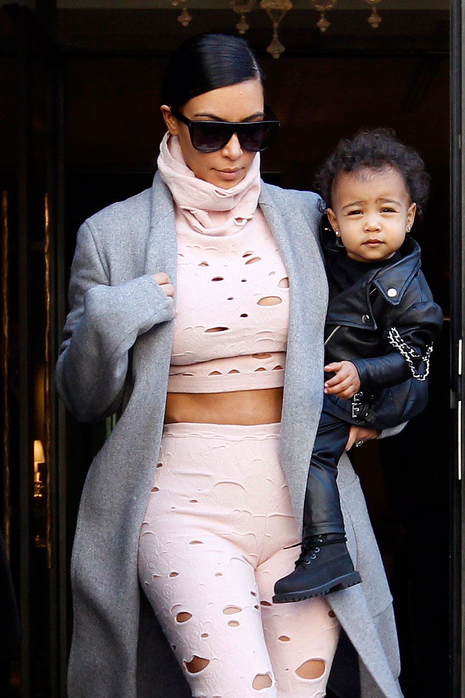 Kim Kardashian heads out for the airport with daughter North West in Paris