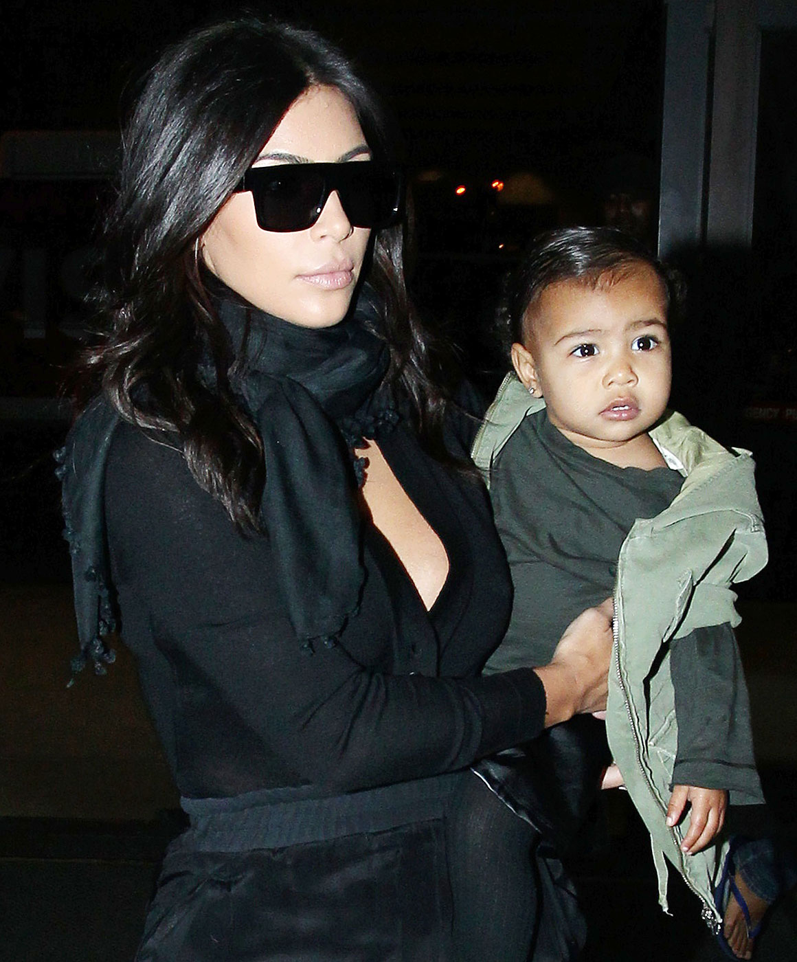 Kim Kardashian, husband Kanye West and baby North West depart from Los Angeles International Airport ***NO DAILY MAIL SALES****