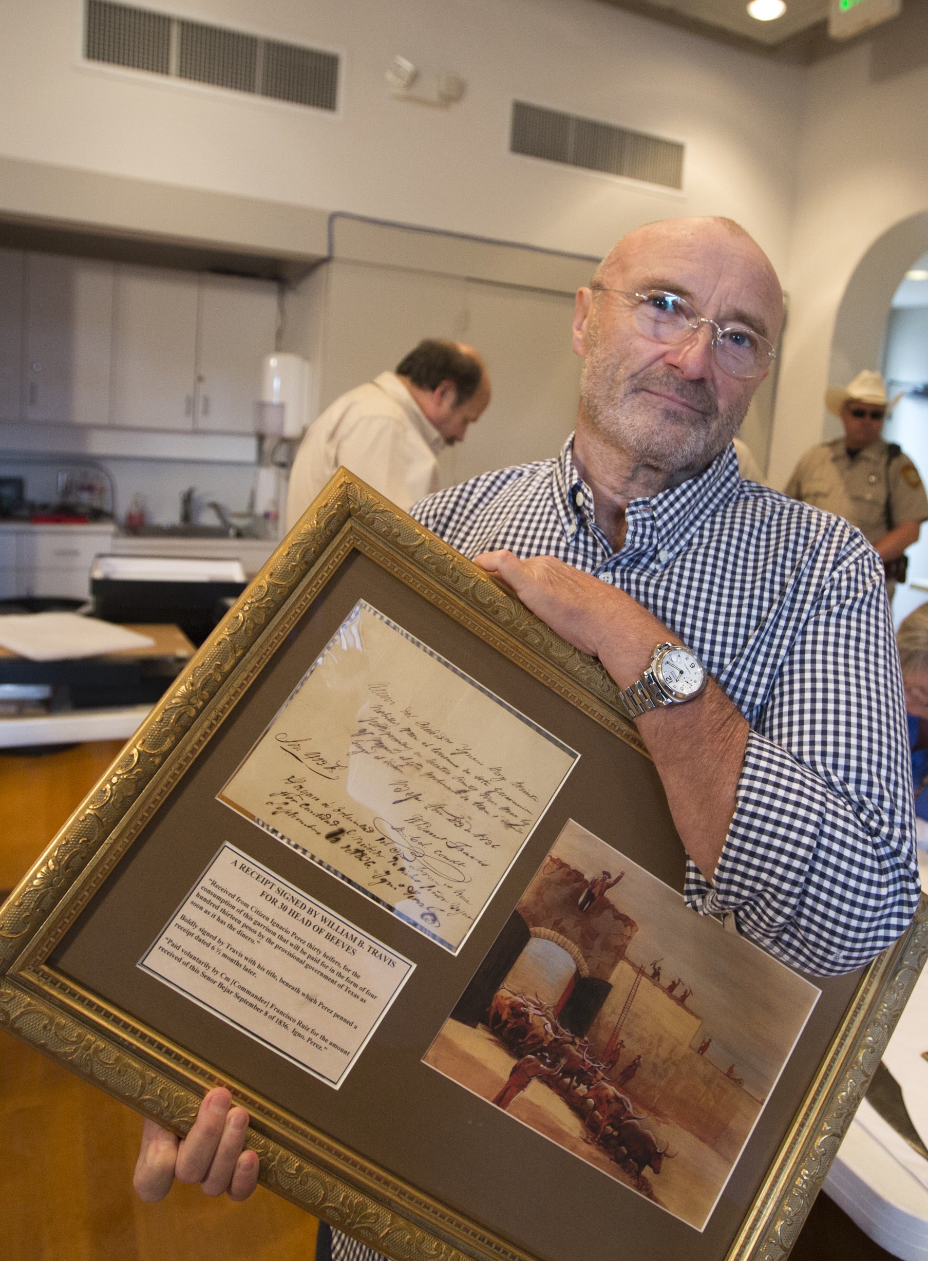 British music legend, Phil Collins donates what is considered the biggest collection of Alamo artifacts to the people of Texas on Oct. 28, 2014. (Bob Daemmrich—Corbis)