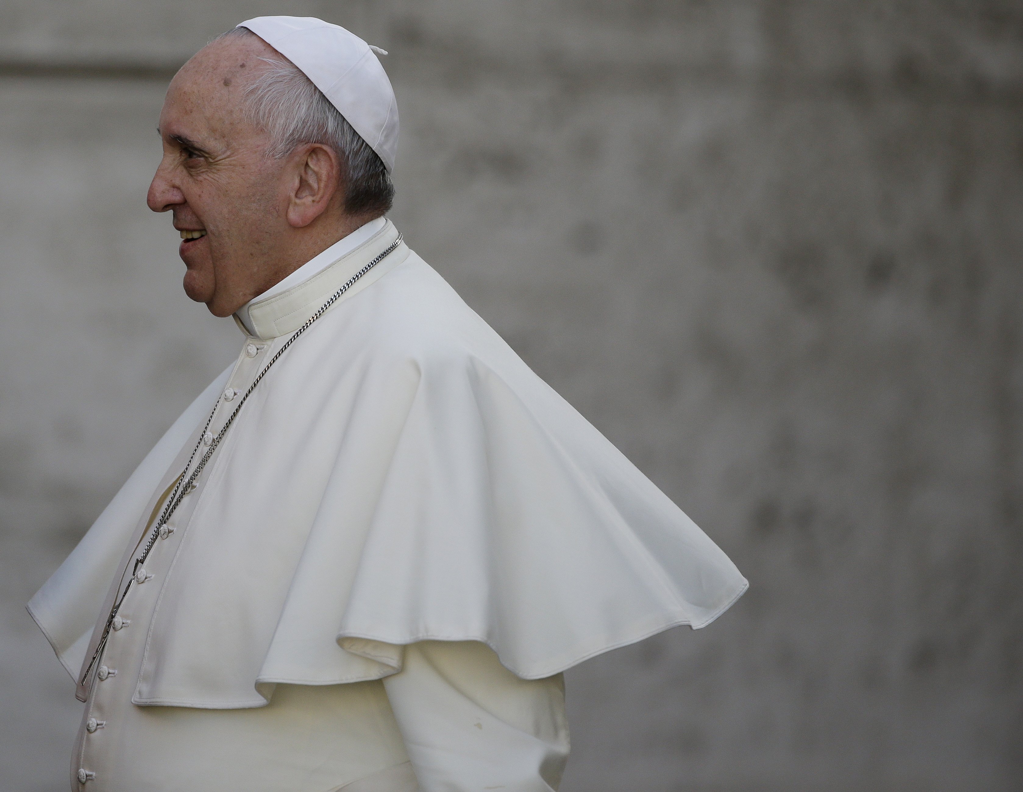 Pope Francis arrives for an afternoon session of a two-week synod on family issues at the Vatican on Oct. 9, 2014. a