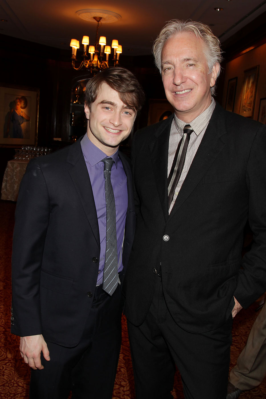 Daniel Radcliffe and Alan Rickman at a luncheon for "Harry Potter and the Deathly Hallows Part 2," at 21 Club, Monday, Nov. 21, 2011, in New York. (Dave Allocca—AP)