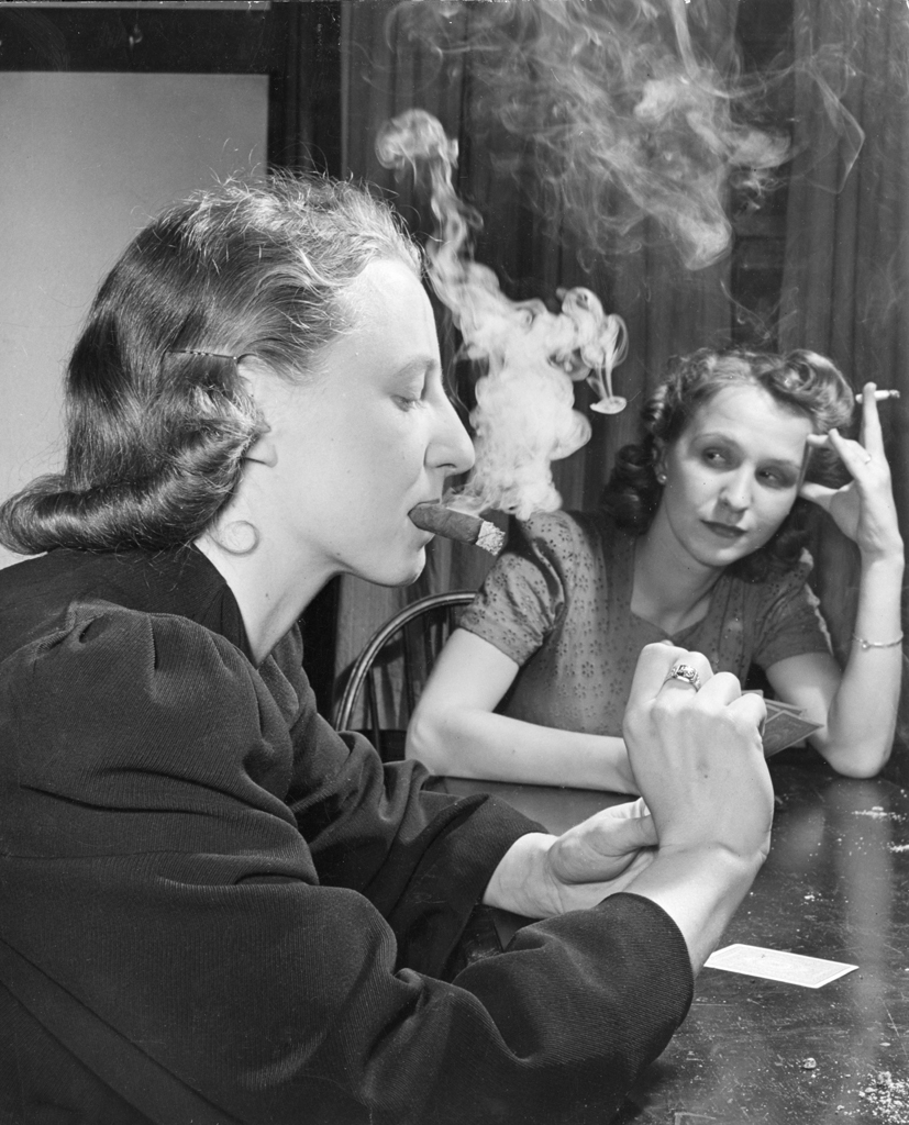 LIFE made a point of noting that during poker Joan Thornwaite (left) "chewed her cigar fitfully" and "failed to get sick."