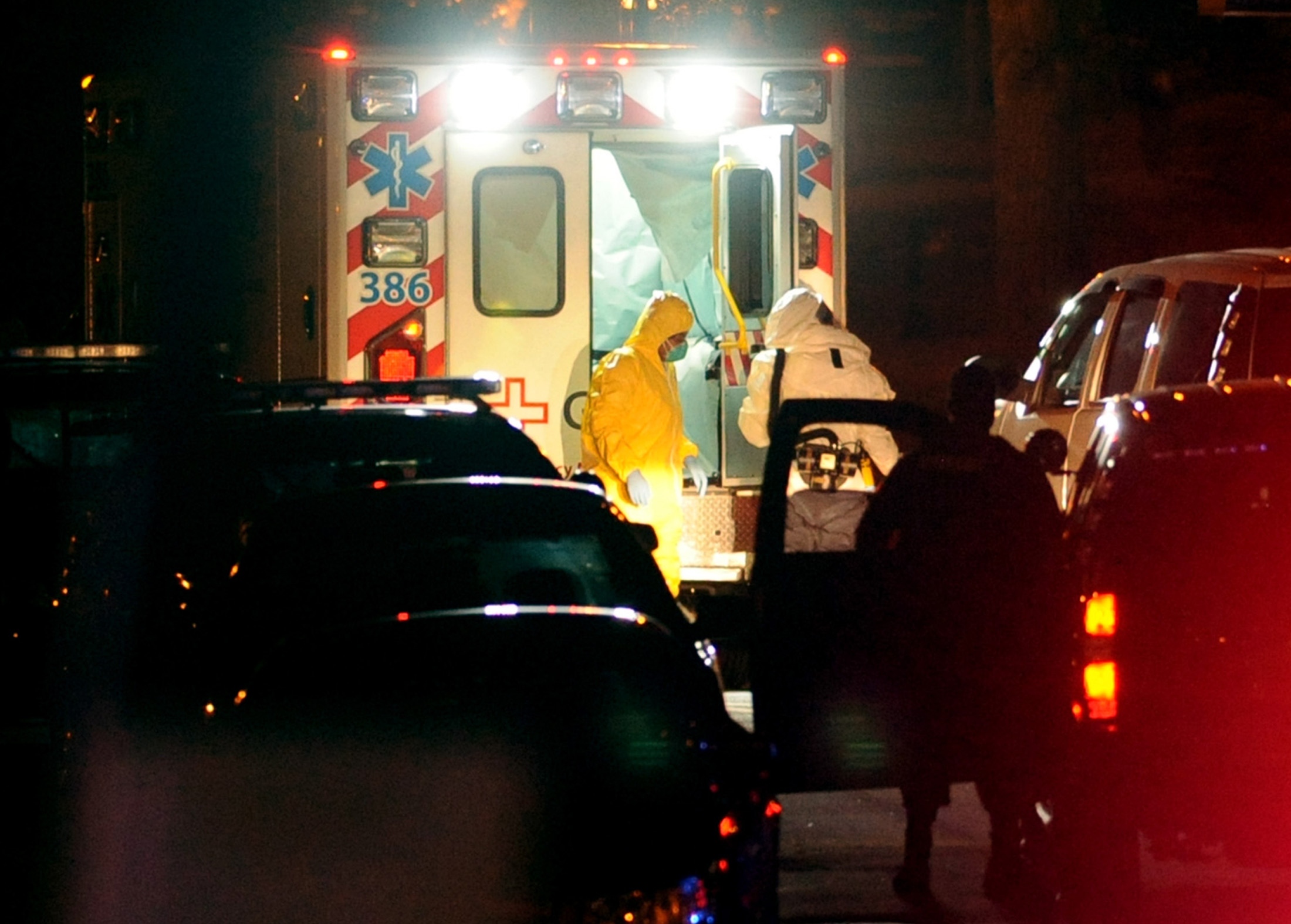 Texas nurse Amber Vinson, left, steps from an ambulance at Emory University Hospital in Atlanta, Ga., on Oct. 15, 2014. (Stringer—Reuters)