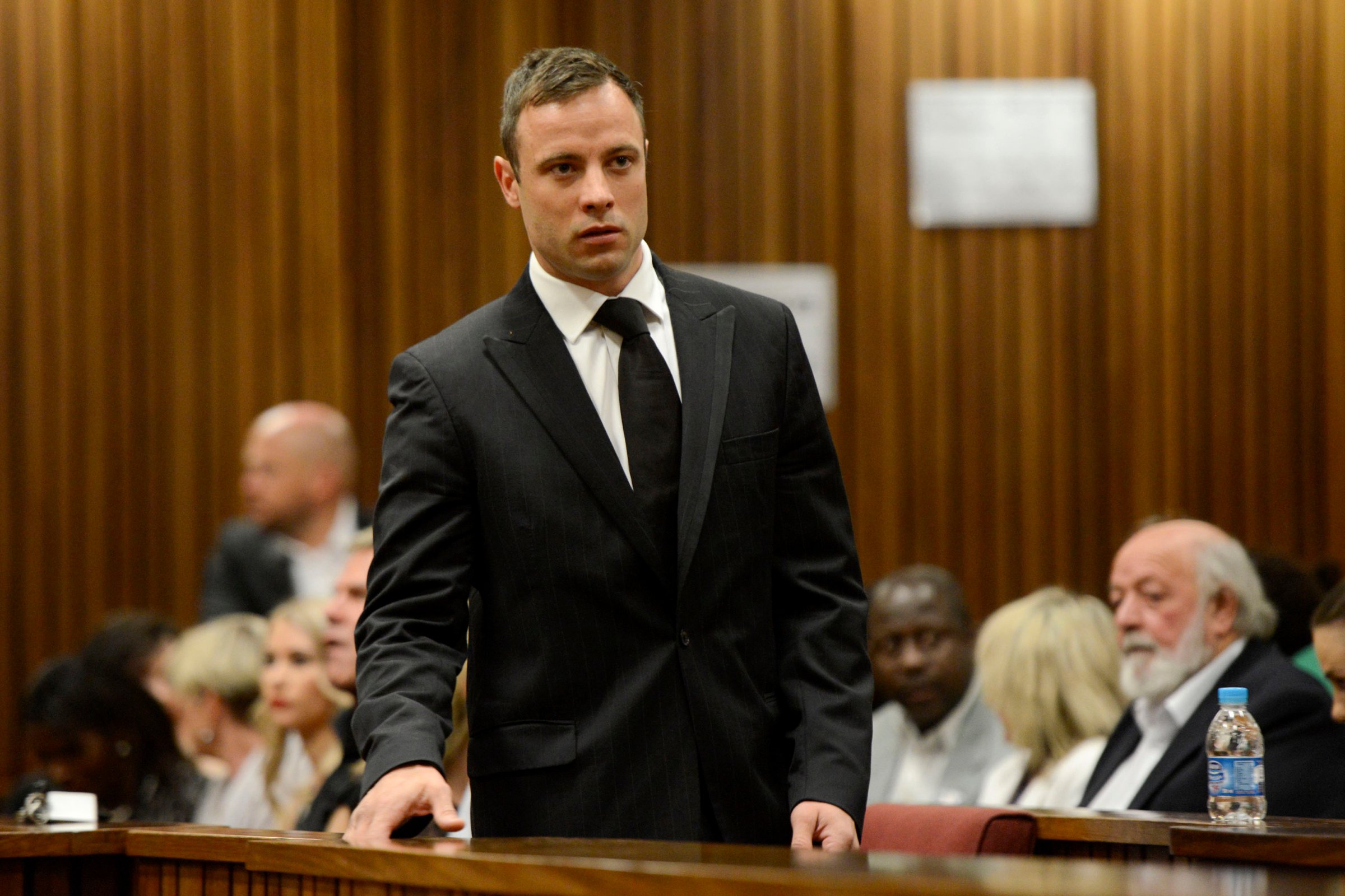 South African Olympic and Paralympic track star Oscar Pistorius attends his sentencing at the North Gauteng High Court in Pretoria