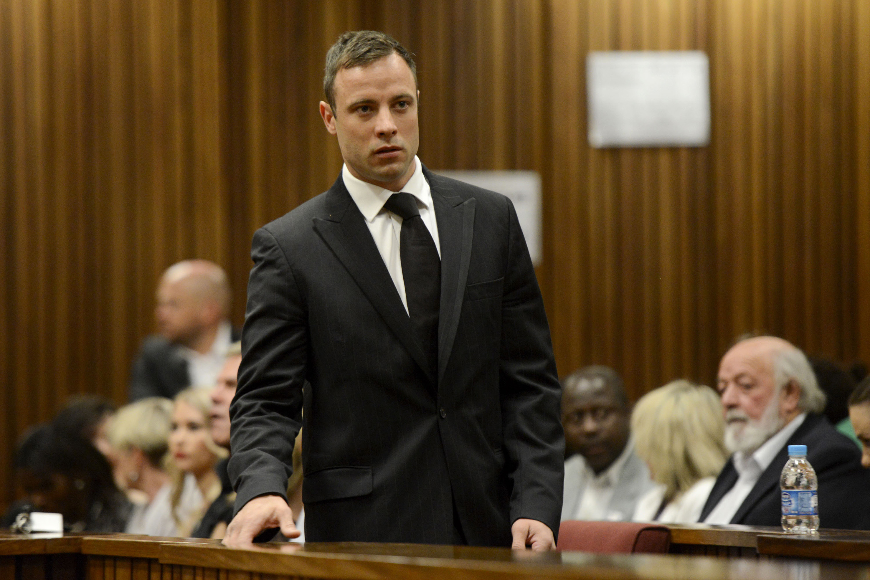 South African Olympic and Paralympic track star Oscar Pistorius attends his sentencing at the North Gauteng High Court in Pretoria