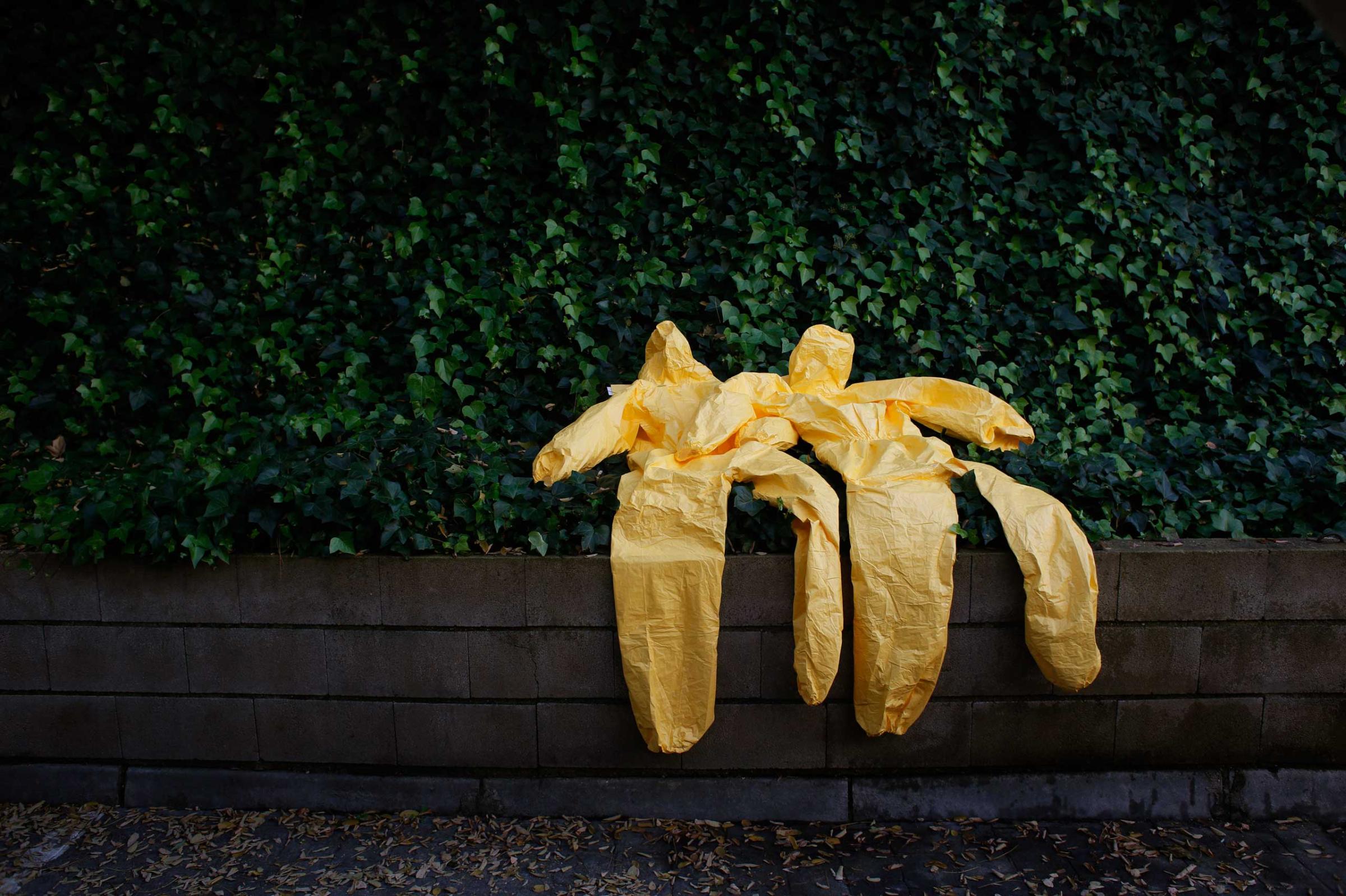 Protective suits are left to dry after an Ebola training session held by Spain's Red Cross in Madrid