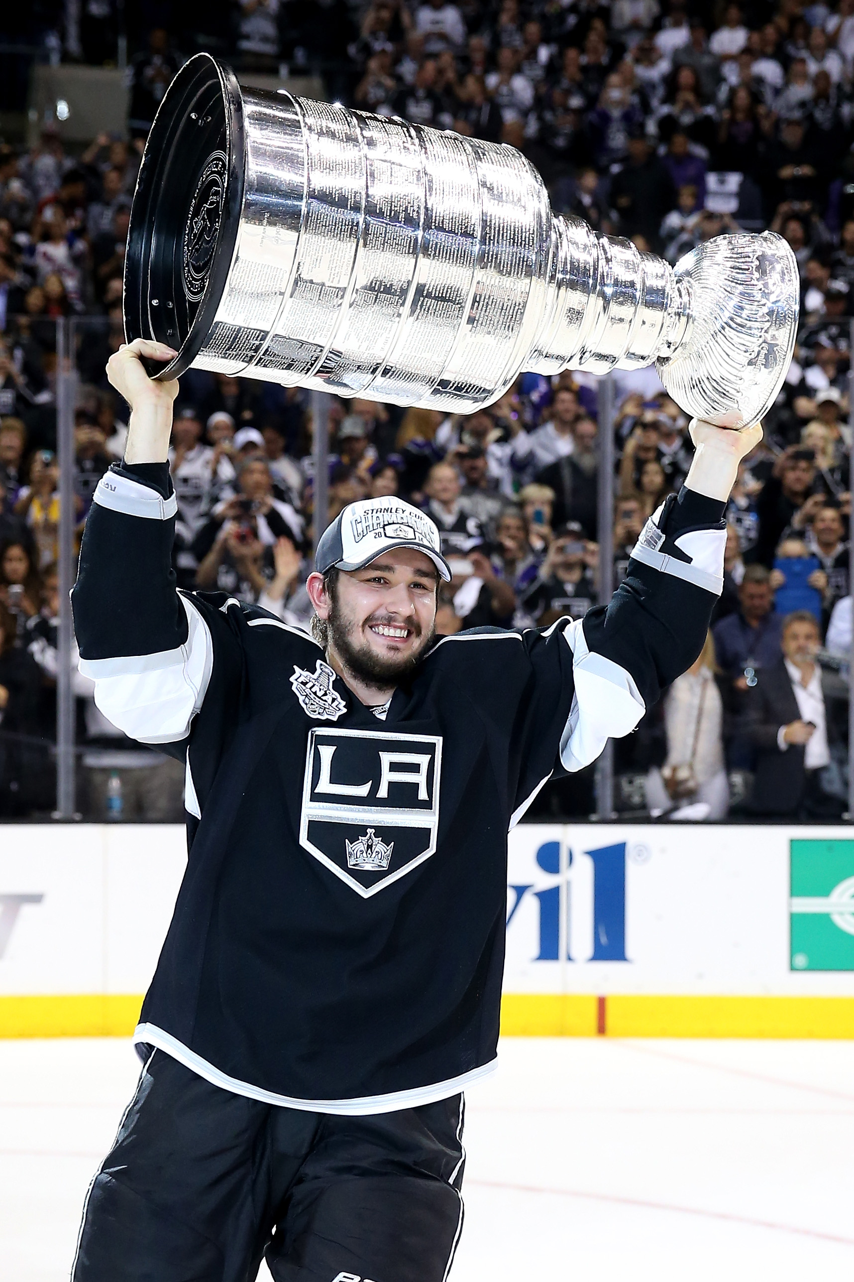 Slava Voynov of the Los Angeles Kings celebrates with the Stanley Cup after the Kings 3-2 double overtime victory against the New York Rangers in Game Five of the 2014 Stanley Cup Final at Staples Center on June 13, 2014 in Los Angeles. (Bruce Bennett&amp;mdash;Getty Images)