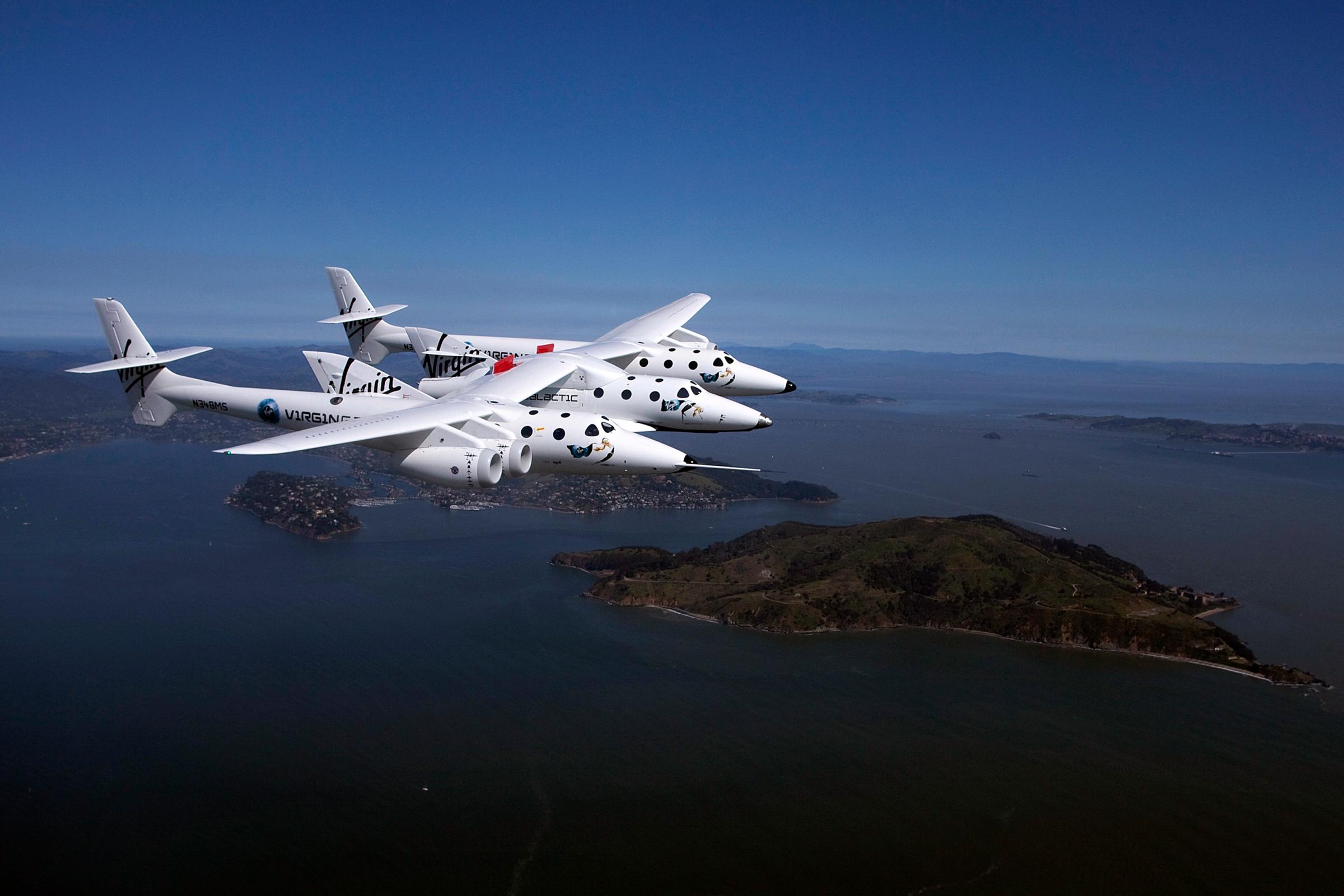 Virgin Galactic's private SpaceShipTwo spacecraft flies over the San Francisco Bay in San Francisco on April 6, 2011.