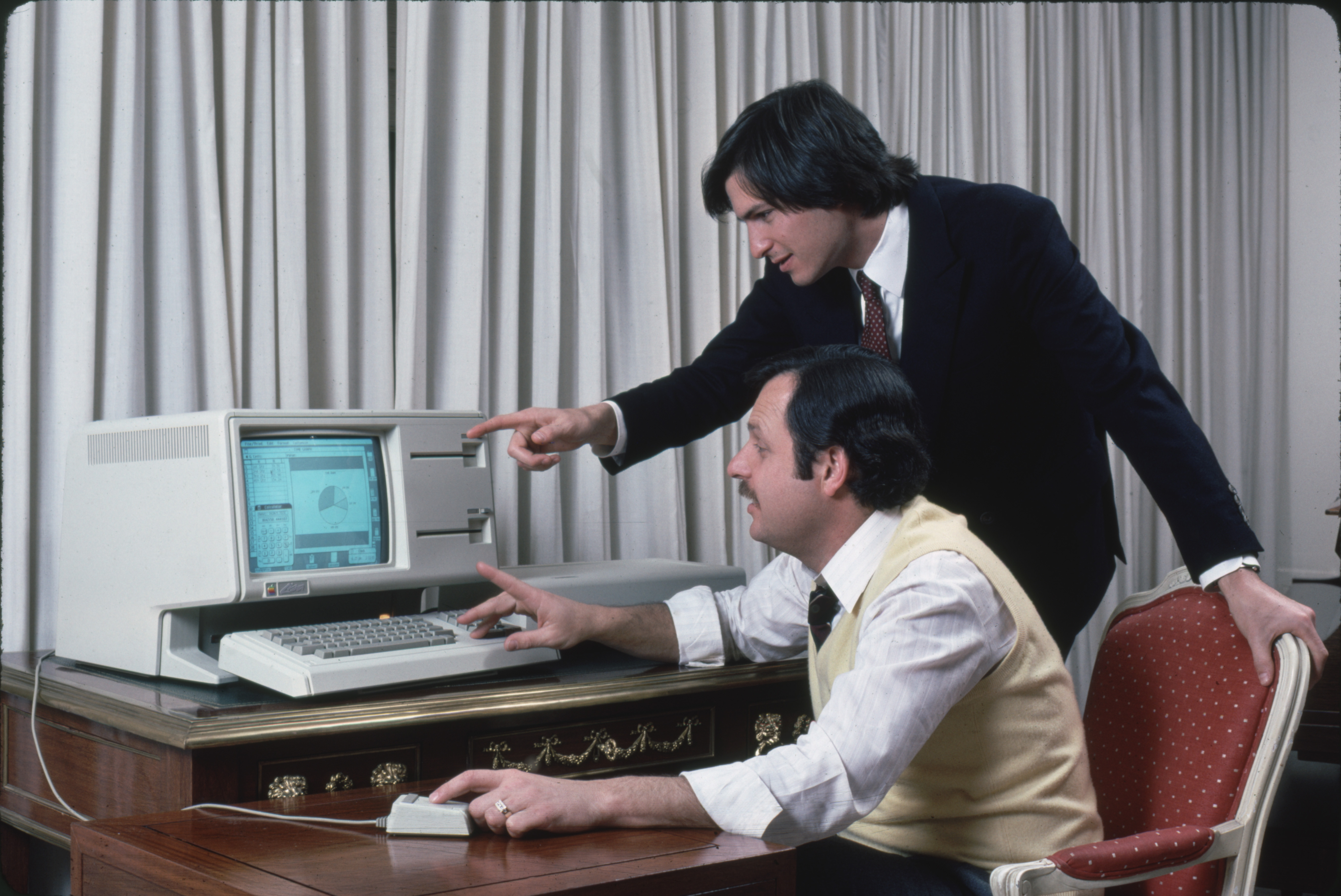 1983 Lisa was Apple's office computer that was the first personal computer to use a graphical user interface. It was a commercial flop, largely because it retailed for a whopping $10,000.