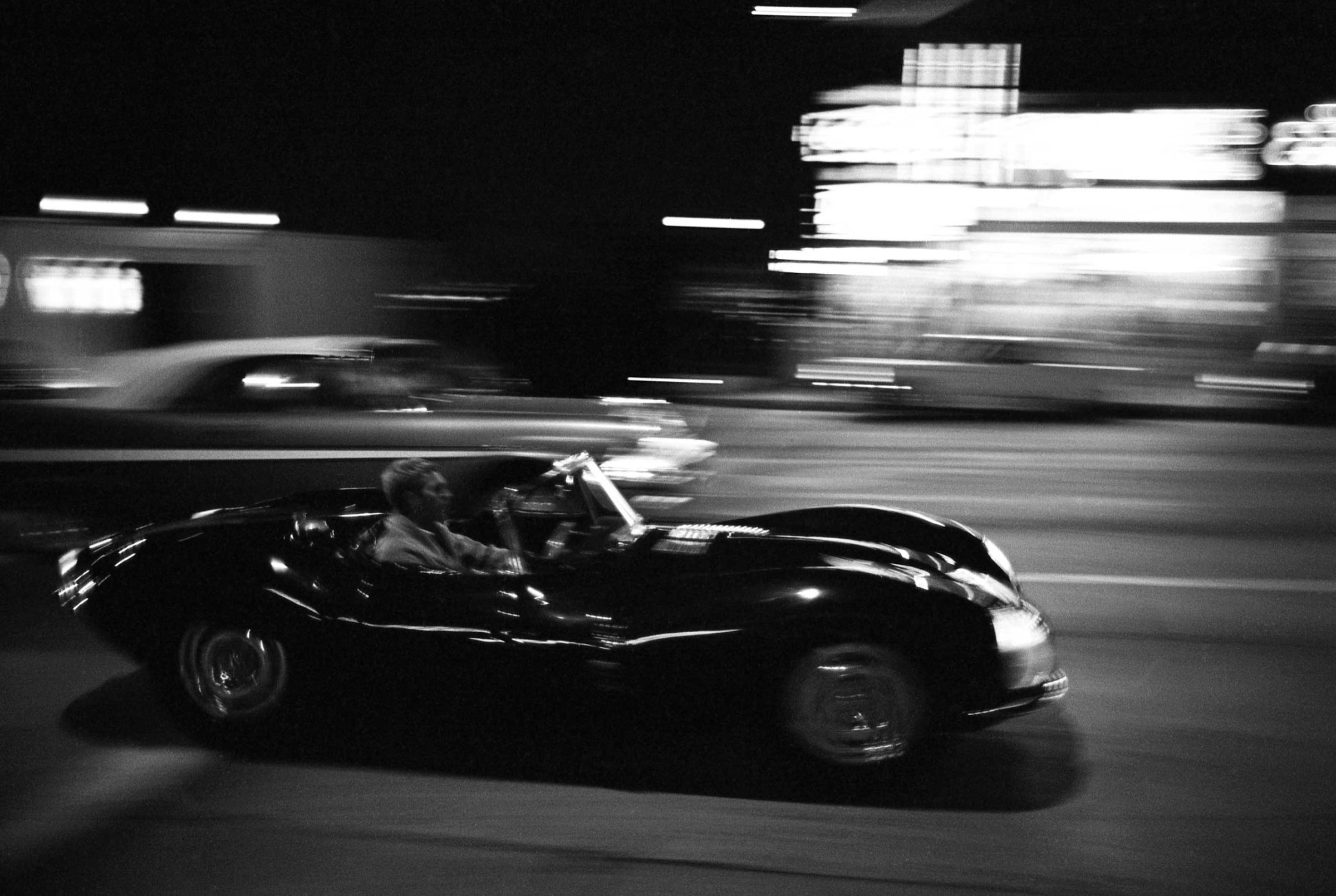 Steve McQueen driving on Sunset Strip, 1963.