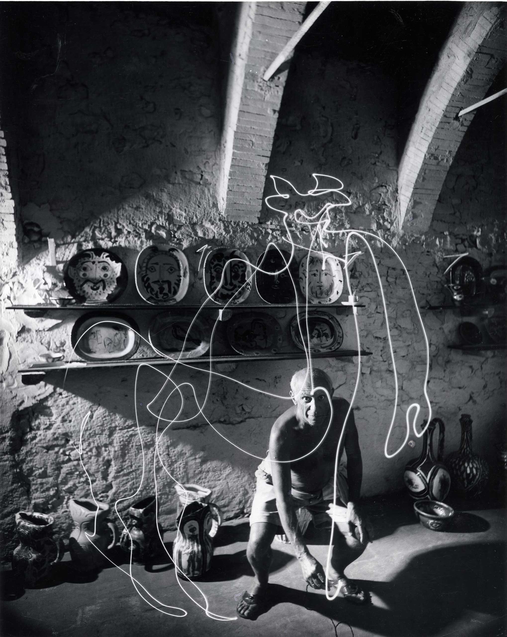 Pablo Picasso drafts a centaur in mid-air with a "light pen" in southeastern France. Originally published in the January 30, 1950, issue of LIFE.