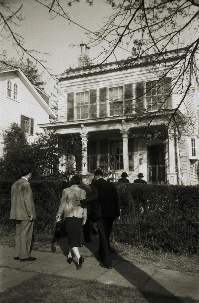 Family and friends return to Einstein's home at 112 Mercer Street in Princeton, where he lived for 20 years, after his funeral, April 18, 1955.