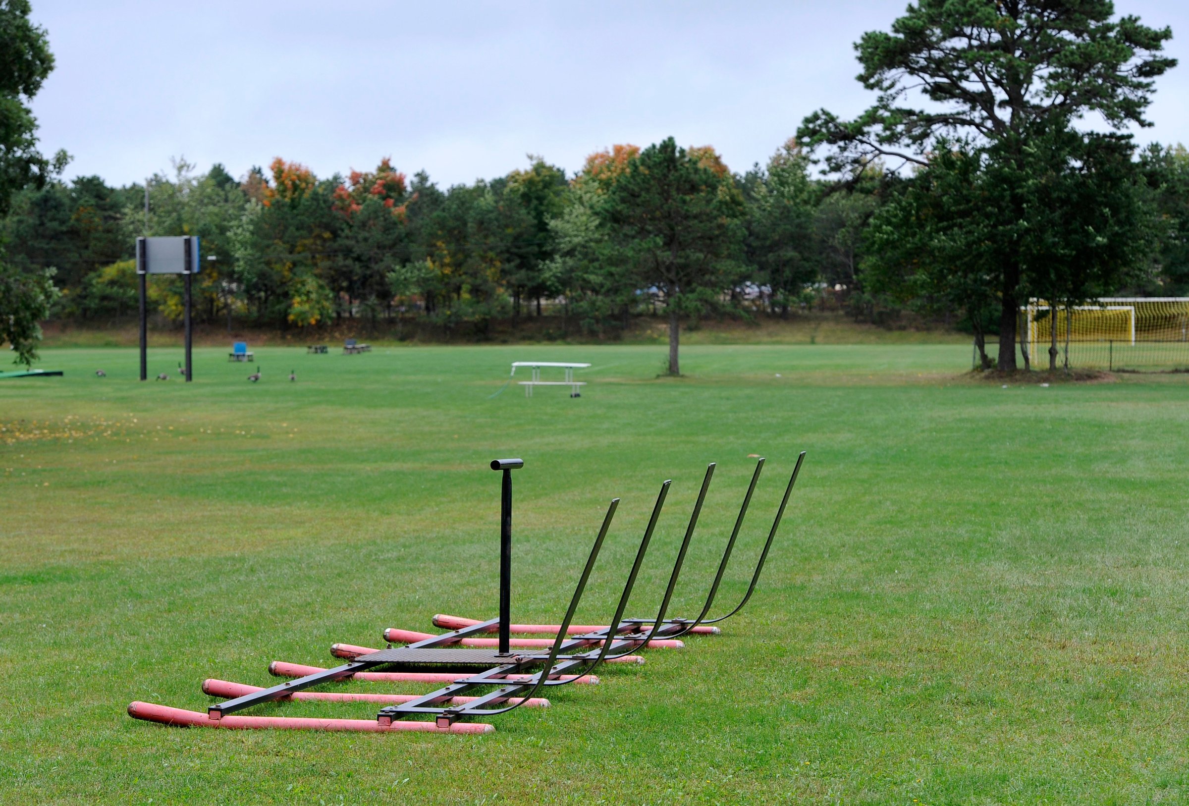 Equipment sits on a football practice field near the main entrance for Shoreham-Wading River High School on Oct. 2, 2014, in Shoreham, N.Y.