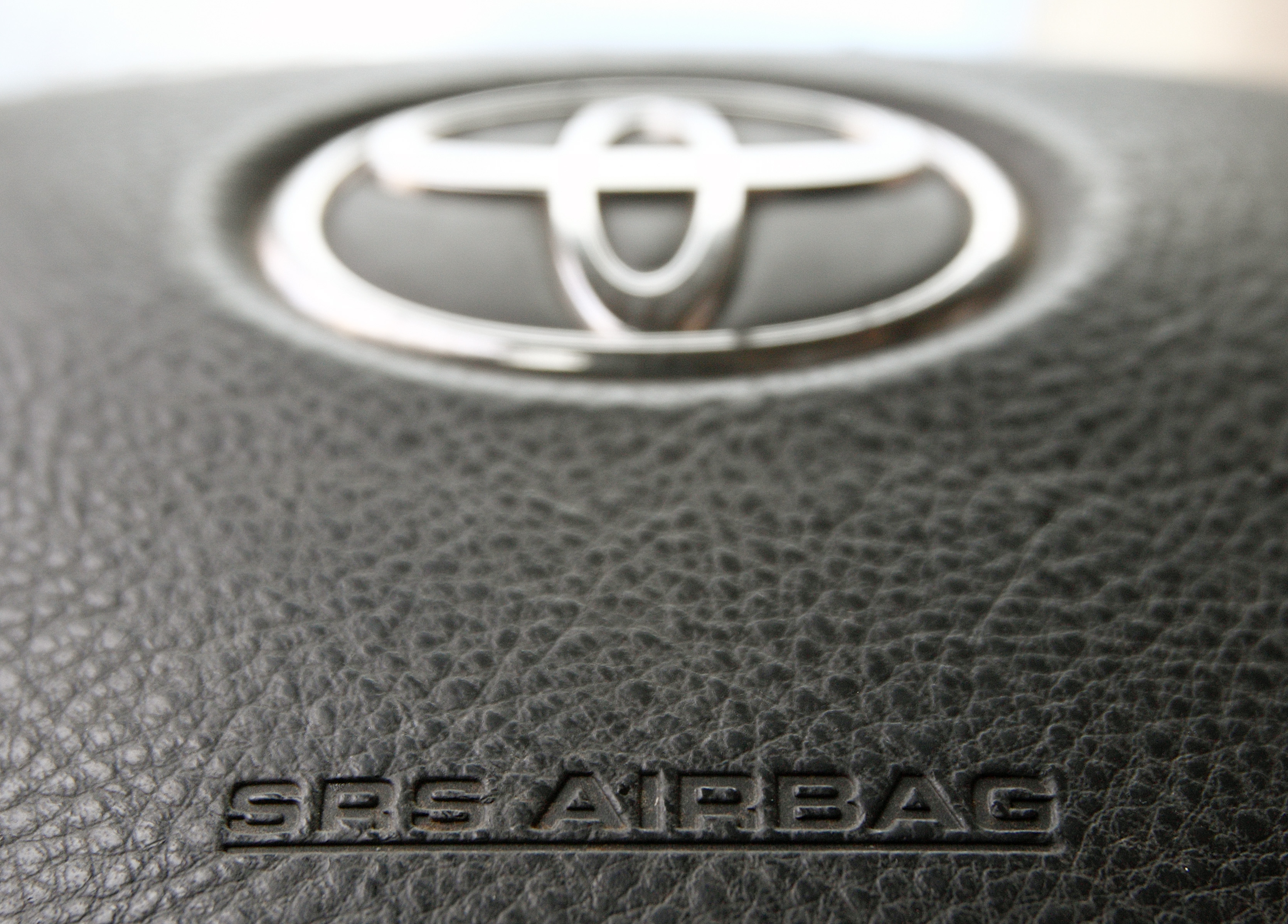 The steering wheel of a Toyota car which contains an airbag is pictured in Vienna