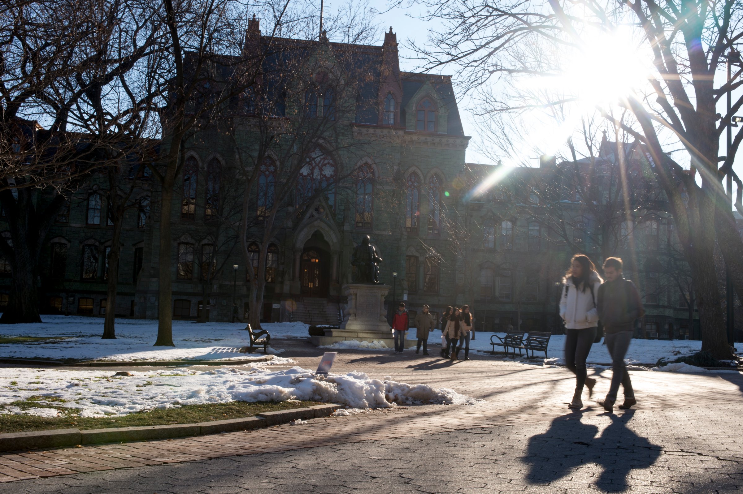 Students walk through the University of Pennsylvania campus on December 16, 2013 in Philadelphia, Pennsylvania.