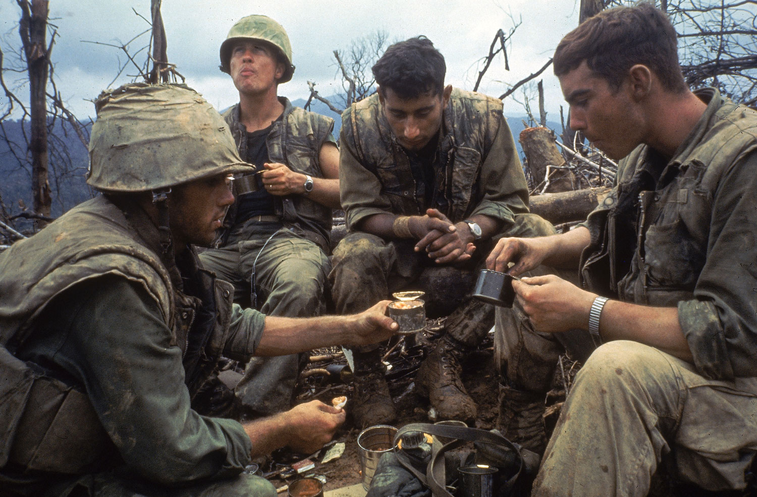 Not published in LIFE. American Marines eat rations during a lull in the fighting near the DMZ during the Vietnam War, October 1966.
