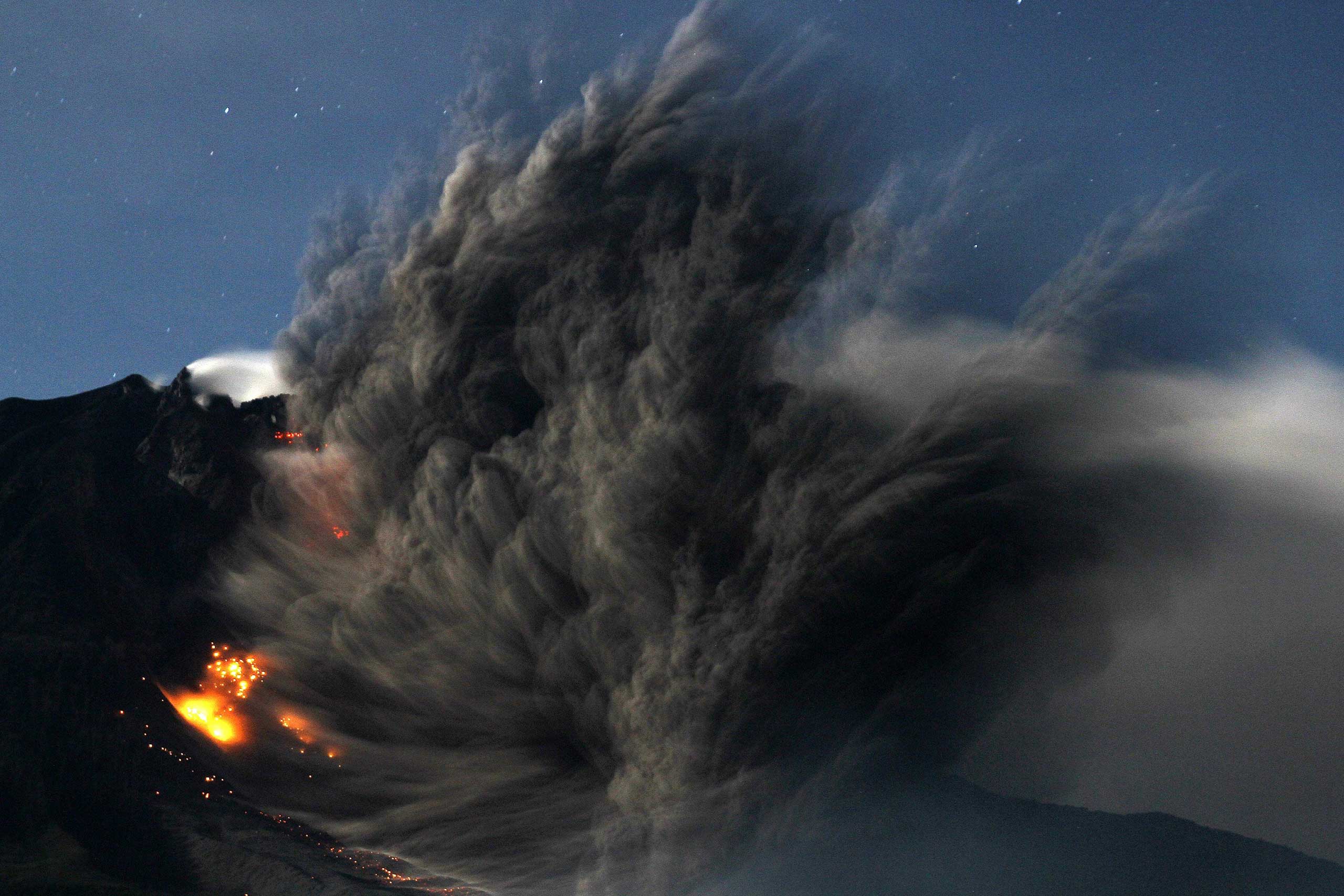 Mount Sinabung volcano erupts in Sumatra, Indonesia on Oct. 9, 2014.