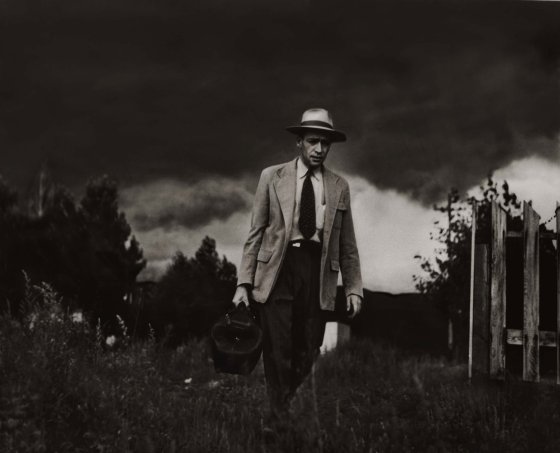 Dr. Ernest Ceriani makes a house call on foot, Kremmling, Colo., 1948.