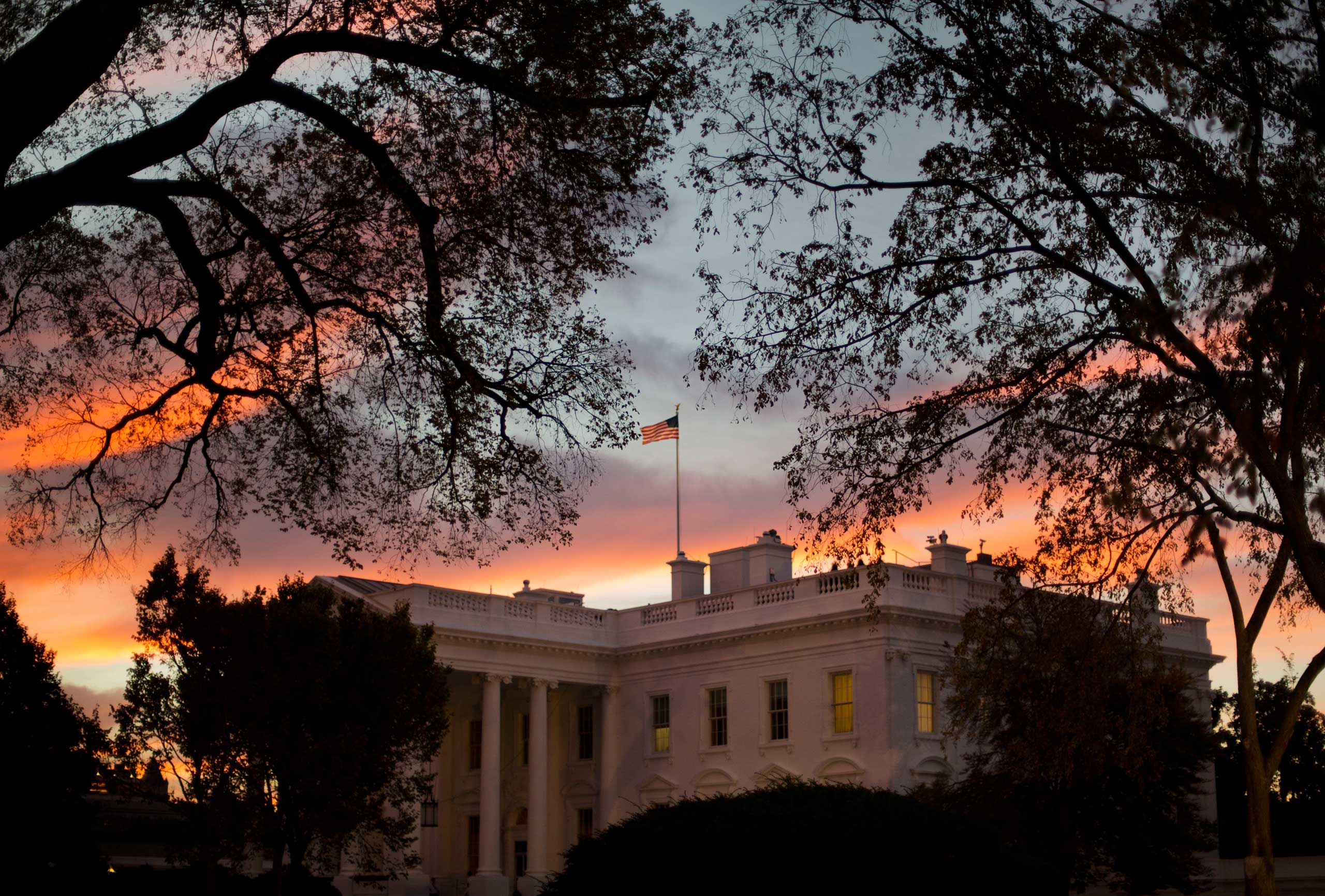 Early morning sunrise is seen over the White House in Washington, Oct. 28, 2014. (Pablo Martinez Monsivais—AP)