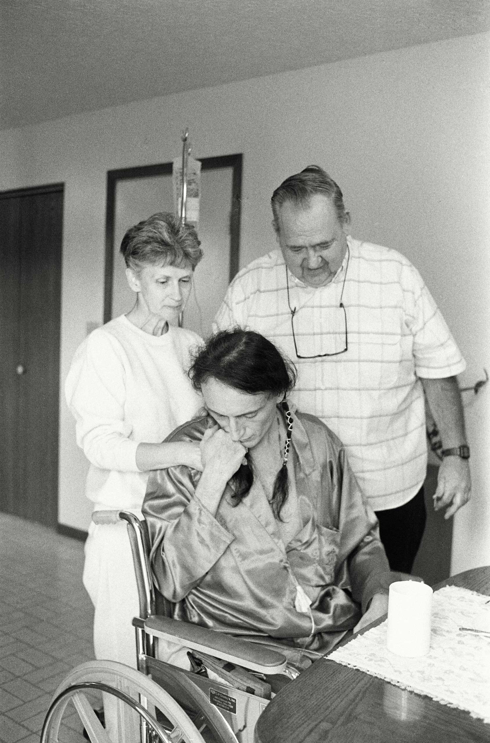 Peta with Bill and Kay Kirby at Pater Noster House, 1992. "I made up my mind," Kay Kirby said, "when David was dying and Peta was helping to care for him, that when Peta's time came -- and we all knew it would come -- that we would care for him. There was never any question. We were going to take care of Peta. That was that."