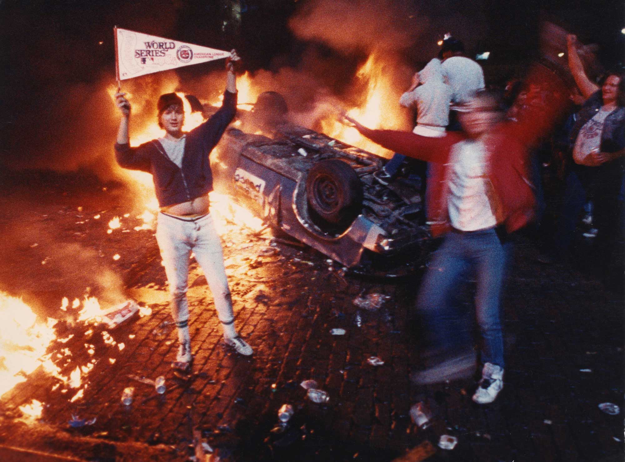 Bubba Helms, left, celebrates after the Detroit Tigers won the 1984 World Series in Detroit in 1984. Detroit erupted into chaos in 1984, following the Tigers' World Series victory over the San Diego Padres.