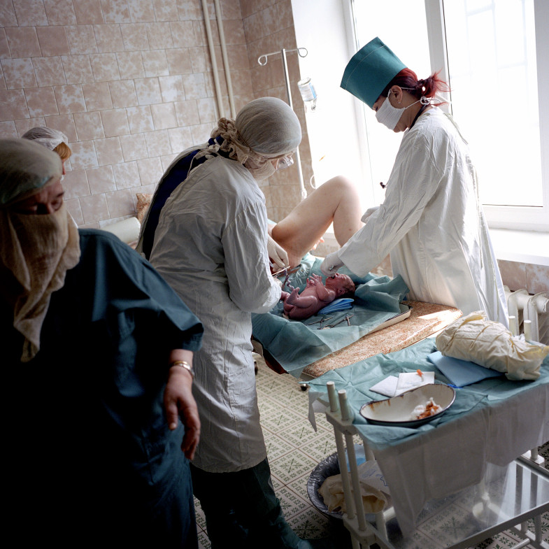 Ira, who is HIV-positive, gives birth to Zhenia, her eighth child. Odesa, Ukraine, 2005