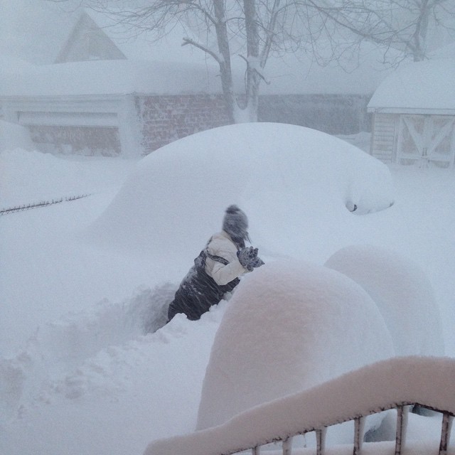 David Rodriguez, of Buffalo, N.Y., posted this photo to Instagram, stating:  Mother digging her way to the car to retrieve some personal items. I grew up with winters like this. Pic via my brother, @izzyroyale