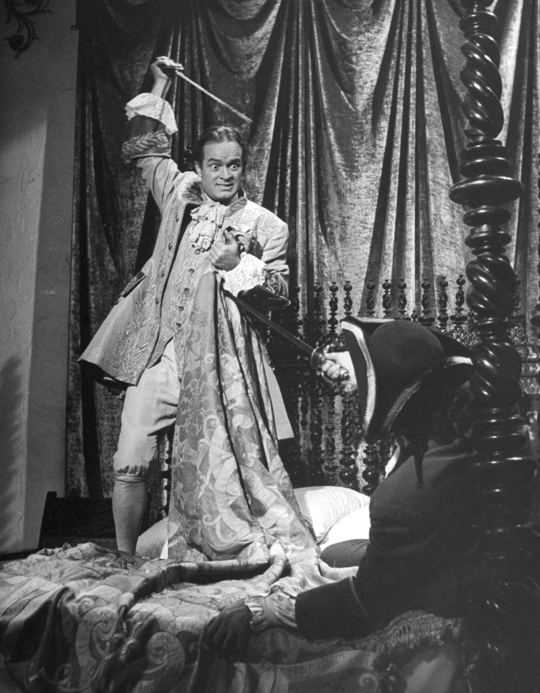 Bob Hope wielding a sword in scene from the movie, Monsieur Beaucaire.