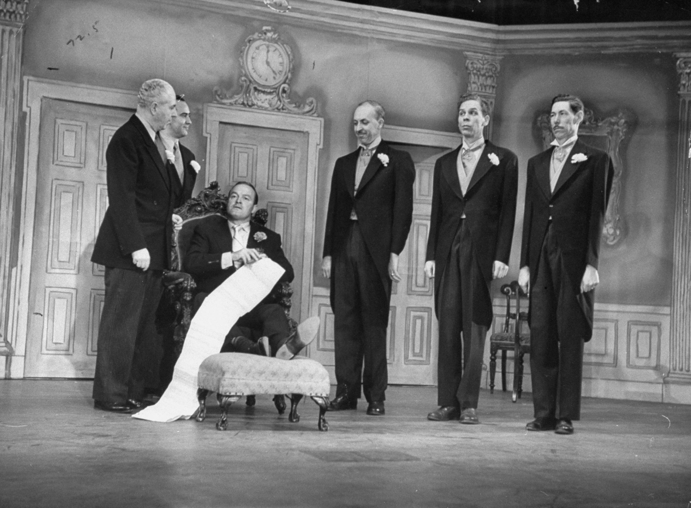 Bob Hope (seated) performing in a skit on his own TV show, 1950.