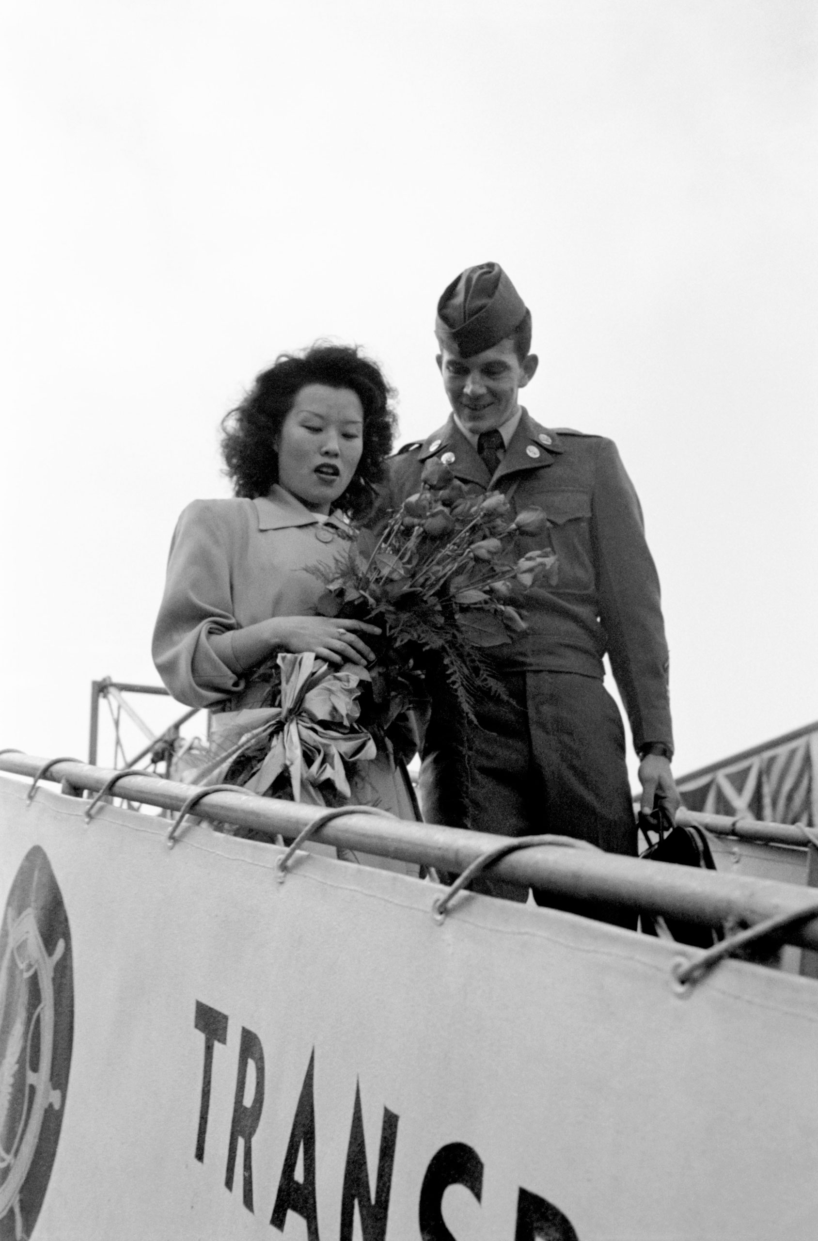 Sgt. Johnie Morgan arrives in Seattle with his wife, "Blue," 1951.