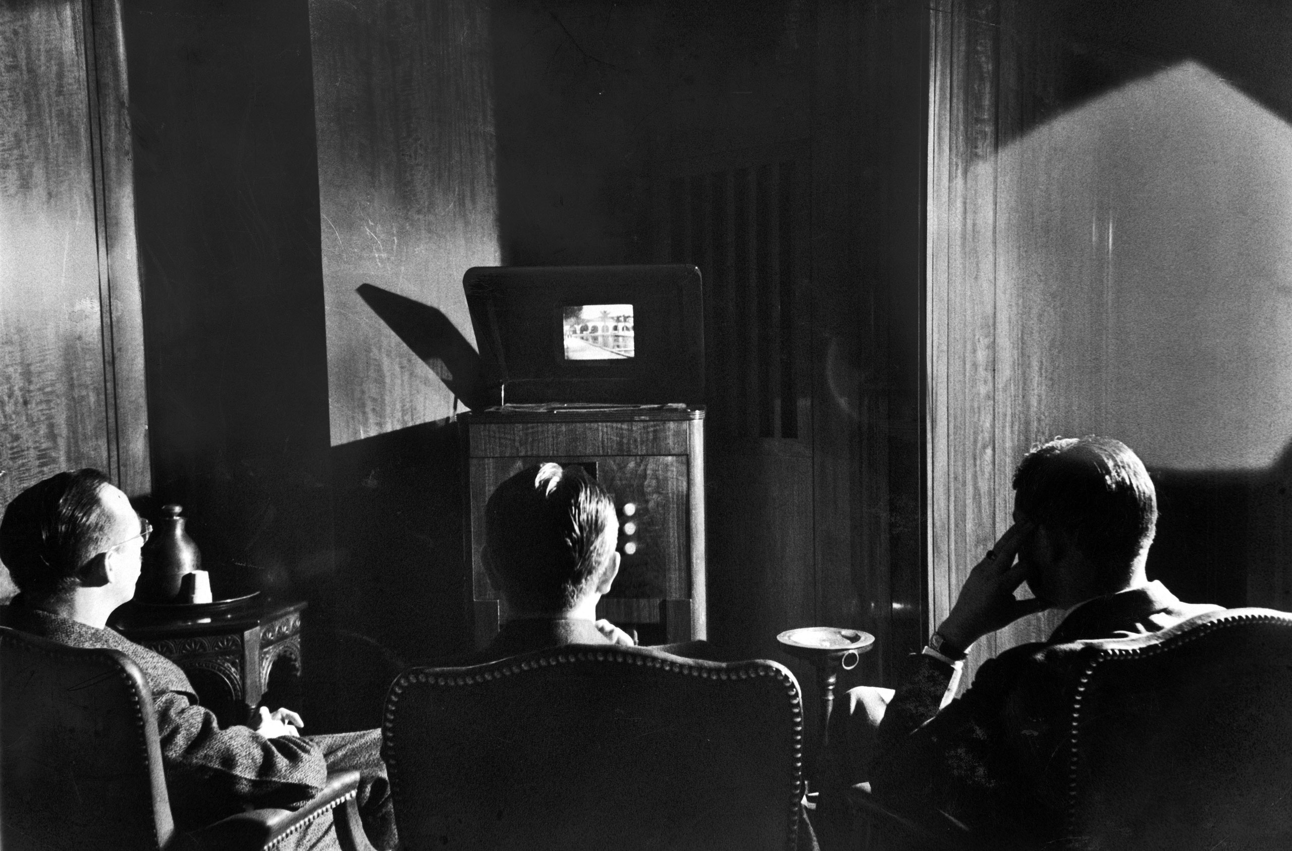 Radio Corporation of America (RCA) executives watch a brand new invention called television, their New York offices before introducing the product to the public, 1939.