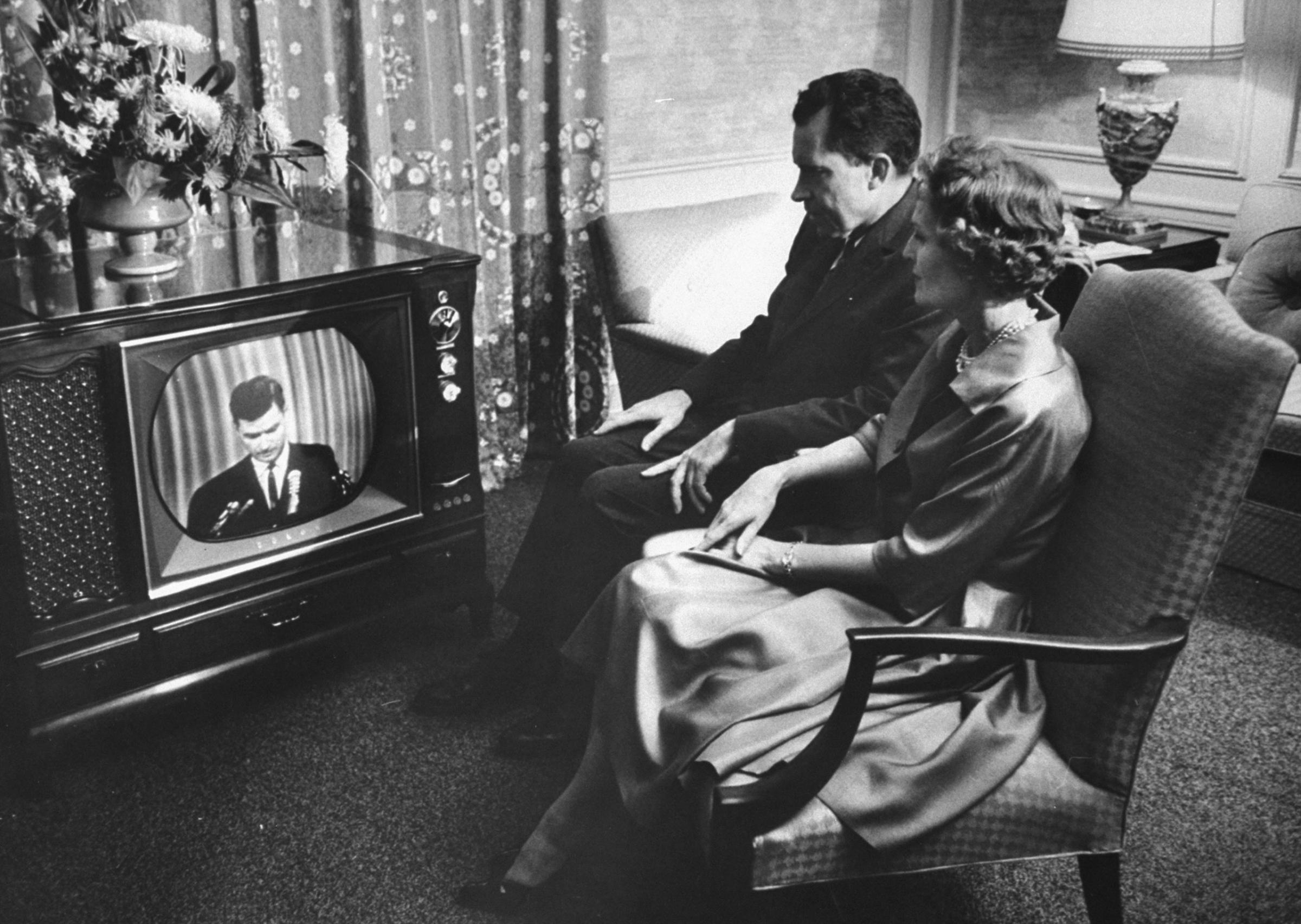 Vice President Richard Nixon and his wife, Pat, watch the 1960 GOP convention in Chicago from their hotel suite.