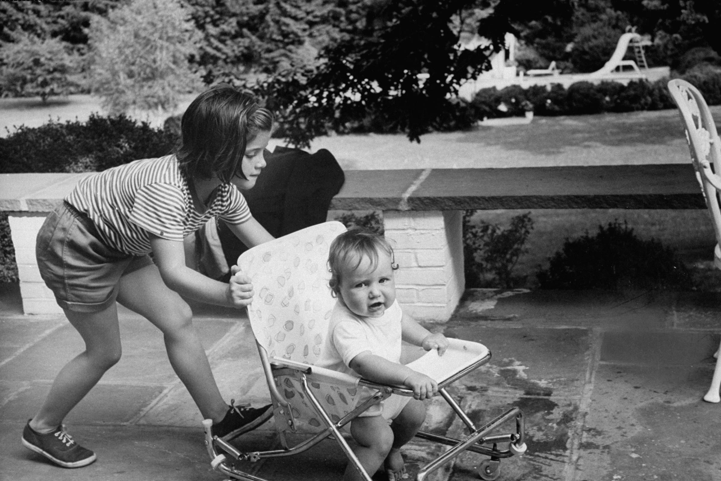 John Kennedy's daughter has eagerly joined Bob's family. She loves to push Christopher in his stroller, stops to cling for a moment to her Uncle Bob. 'She's my pal,' he says fondly. But there is a special feeling for Caroline who, at 6, understands the tragedy of her father's death as her brother John does not.