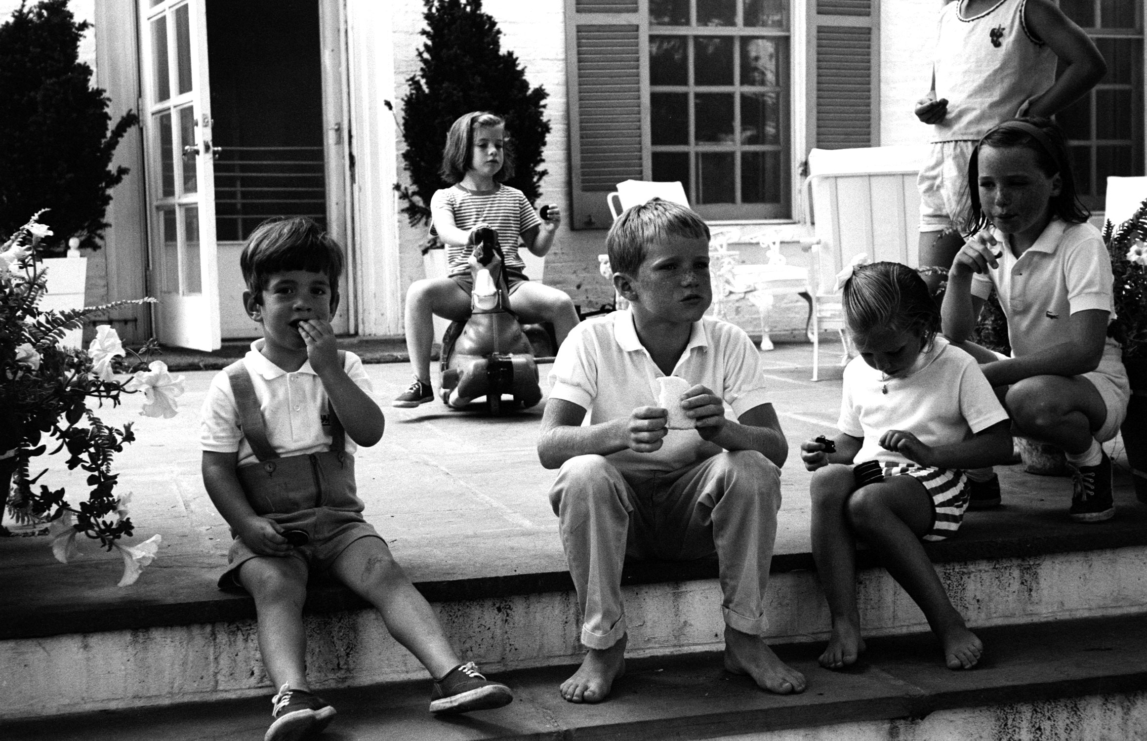 John Kennedy Jr. (left) and his sister Caroline and their cousins David, Kerry and Courtney Kennedy, 1964.